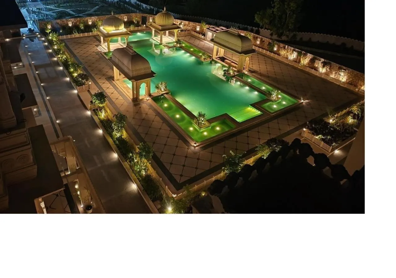 Swimming pool in Wyndham Grand Udaipur Fateh Sagar Lake - Pure Vegetarian Resort