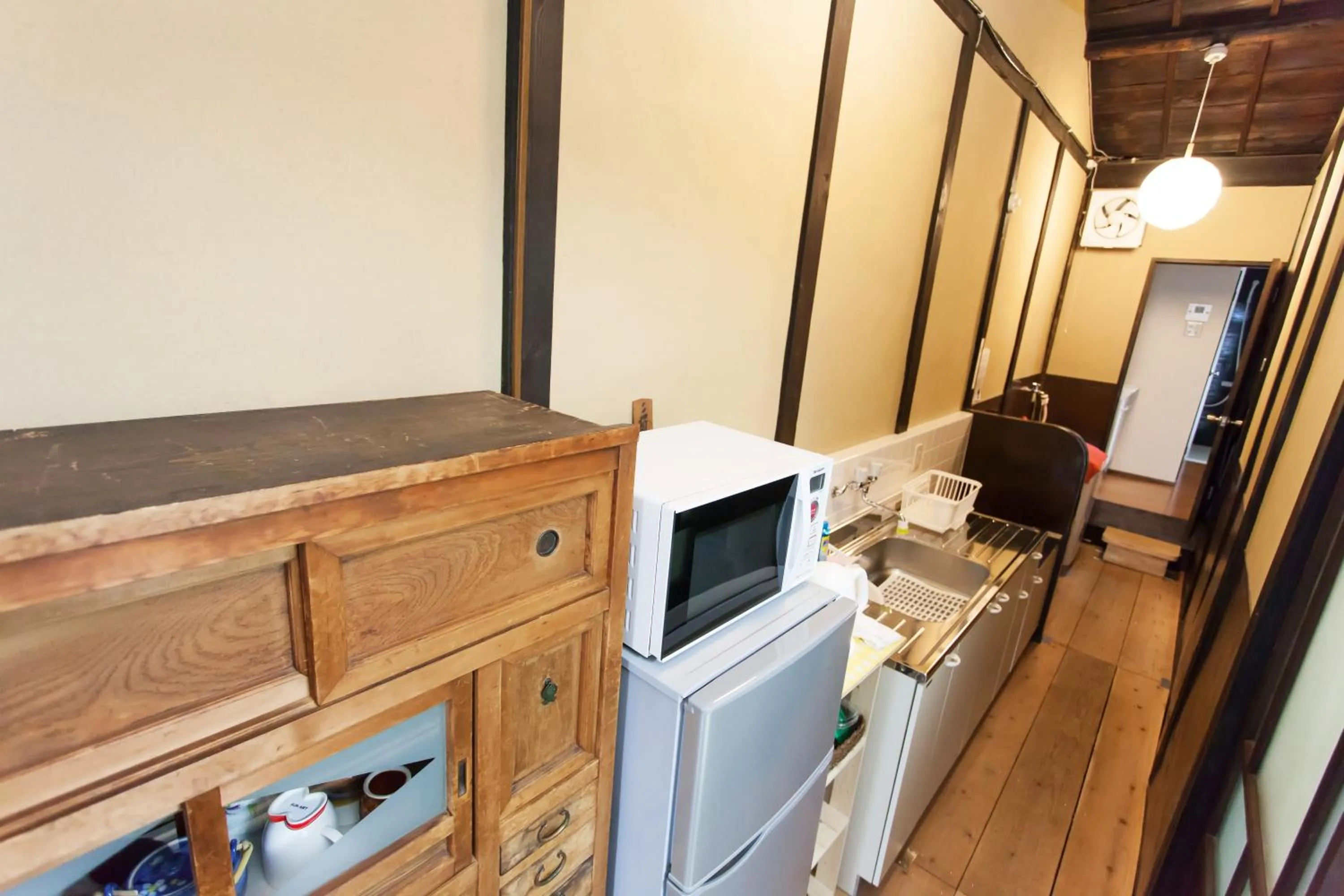 Kitchen or kitchenette in Kujo Stays