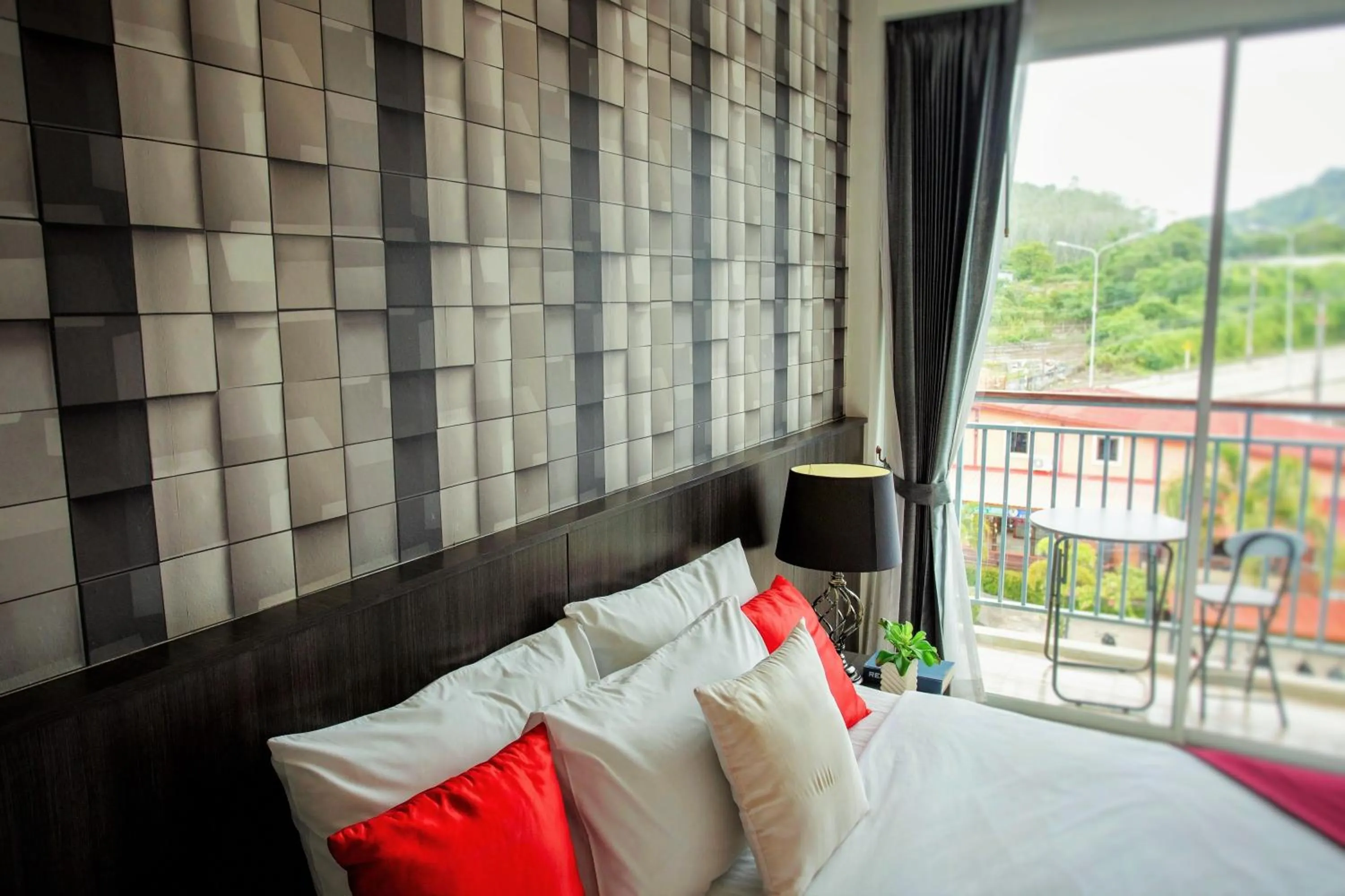 Bed in The Wings Boutique Hotels Krabi Ko Lanta