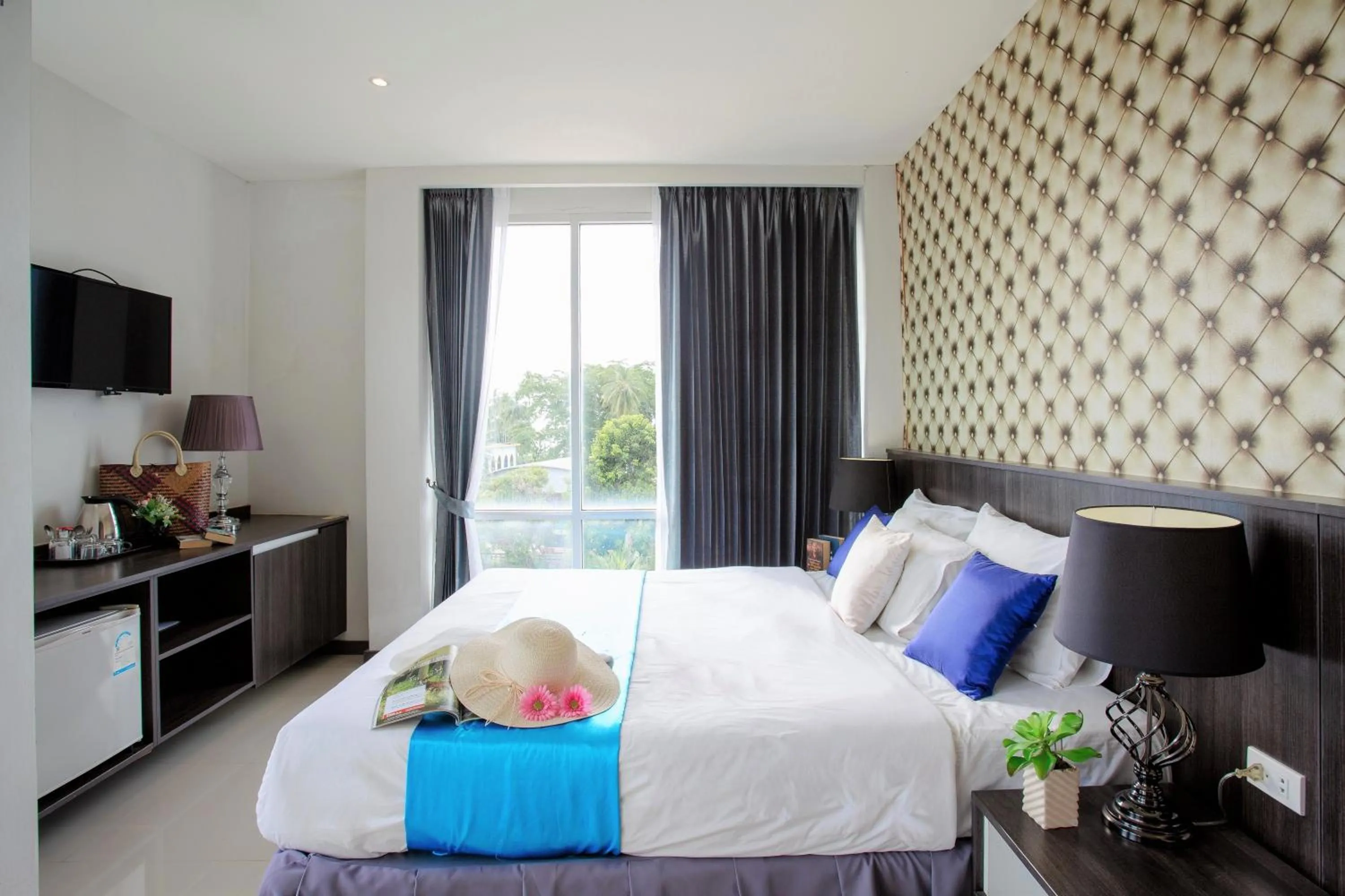 Bed in The Wings Boutique Hotels Krabi Ko Lanta