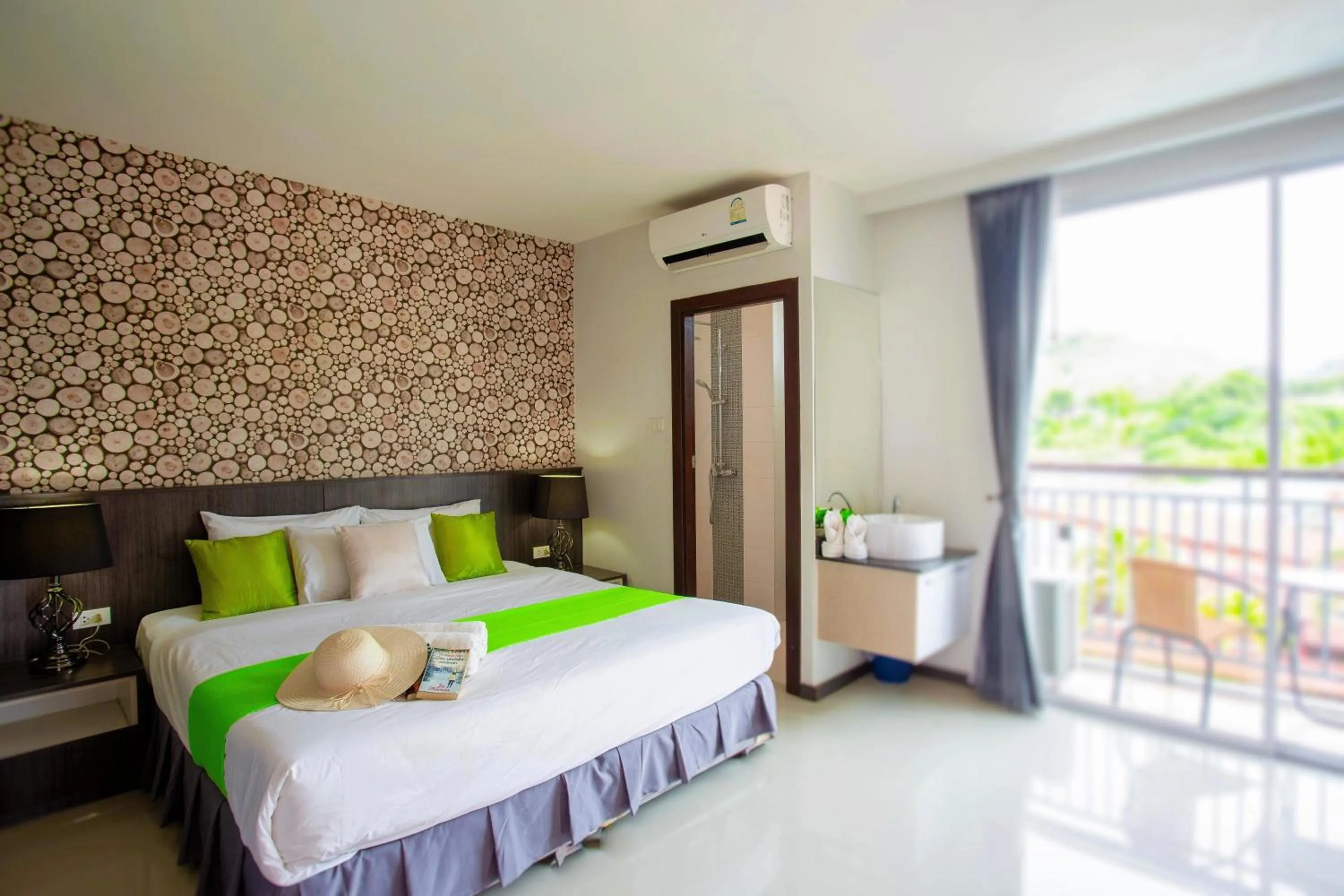 Bed in The Wings Boutique Hotels Krabi Ko Lanta