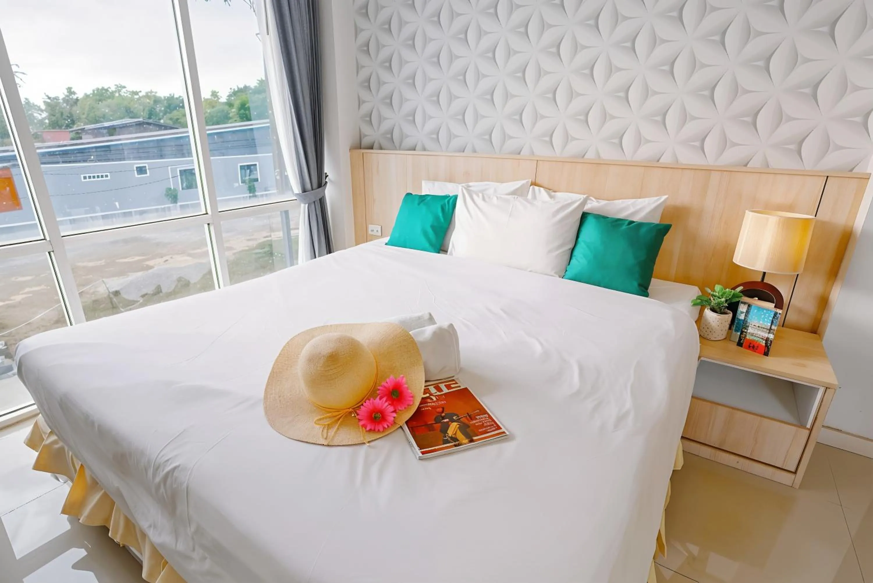 Bed in The Wings Boutique Hotels Krabi Ko Lanta