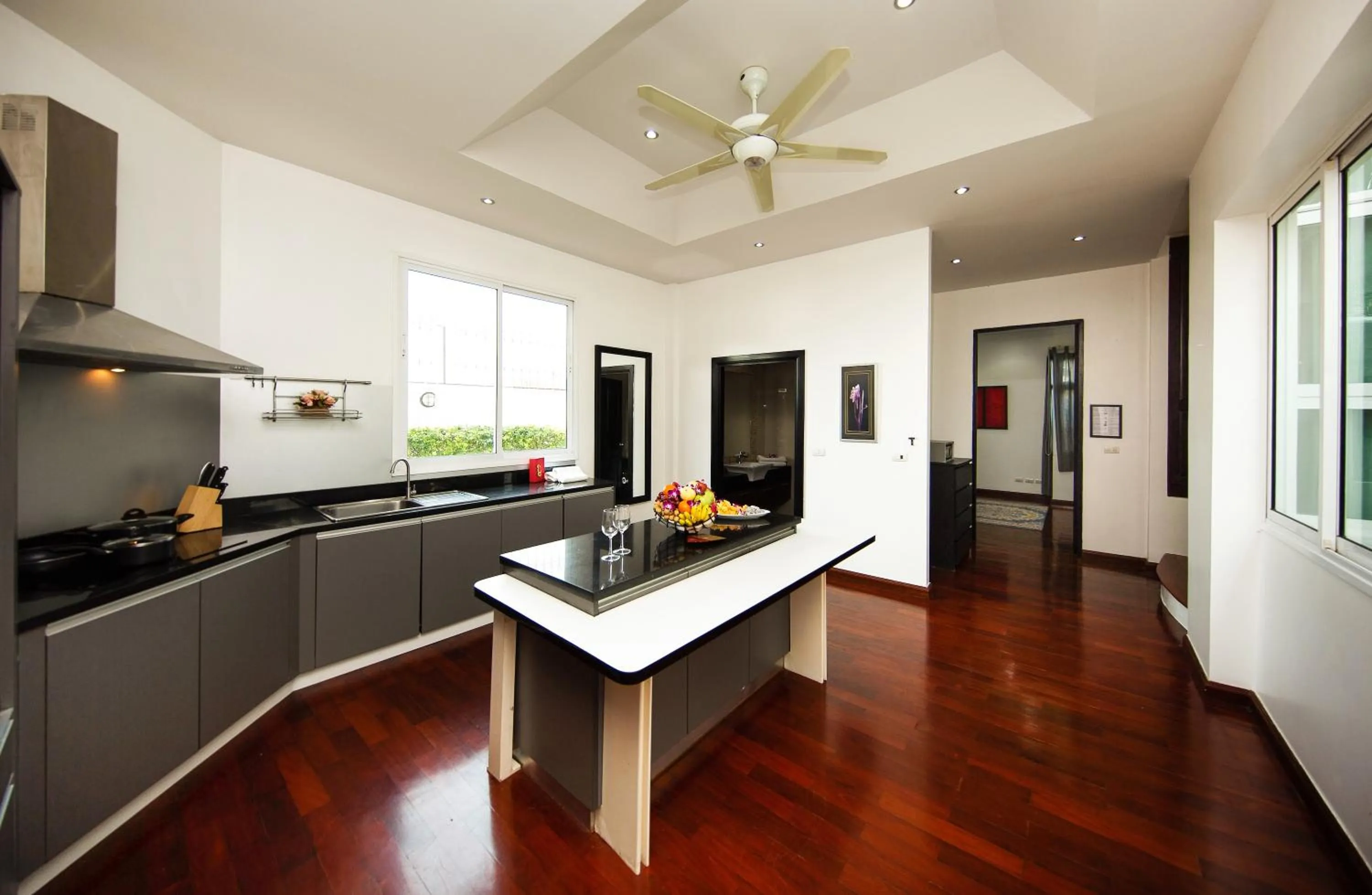 Kitchen or kitchenette in Paradise Pool Villa Pattaya in Tropicana Village