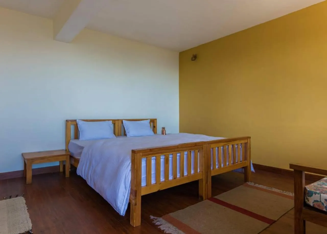 Bed in Kasar Rainbow Yoga Retreat