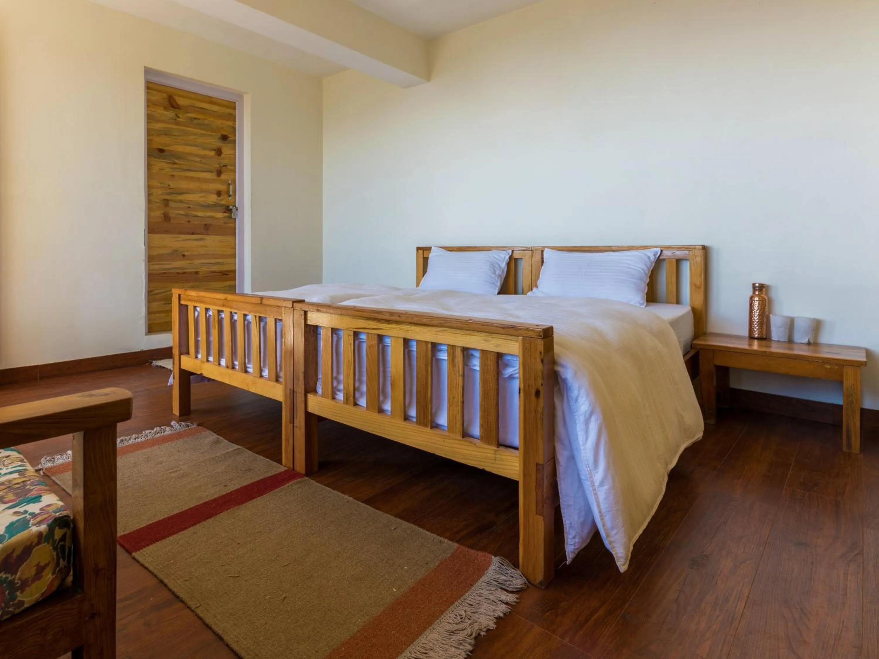 Bed in Kasar Rainbow Yoga Retreat