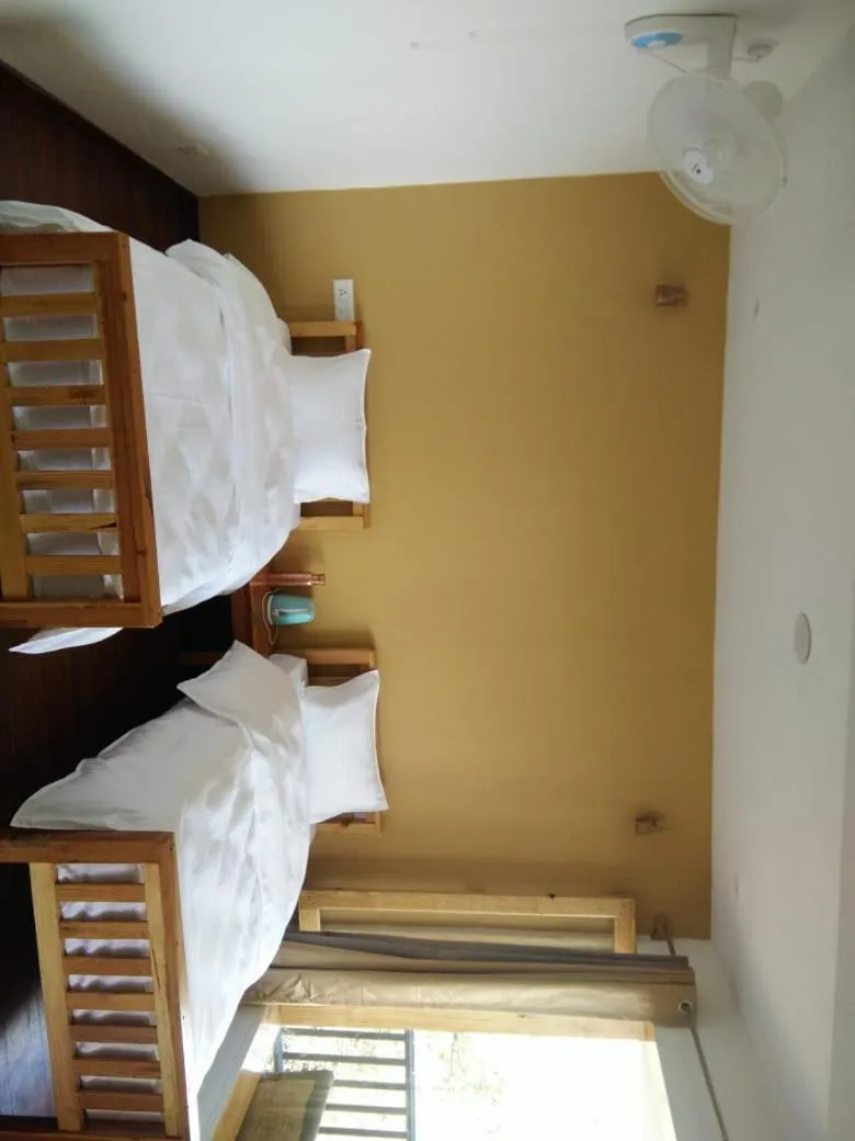 Bed in Kasar Rainbow Yoga Retreat