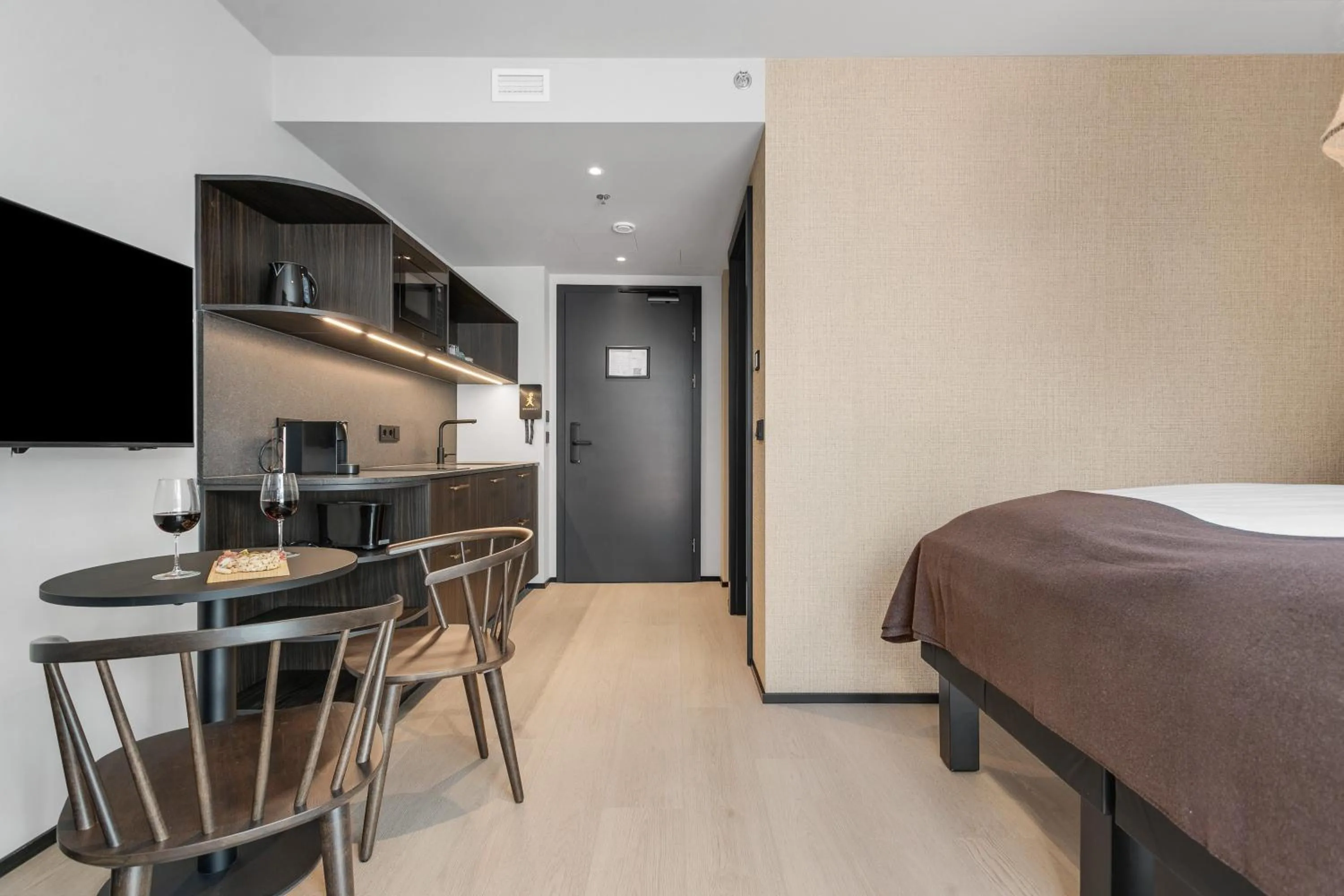 Bed in Strand Hotel Apartments