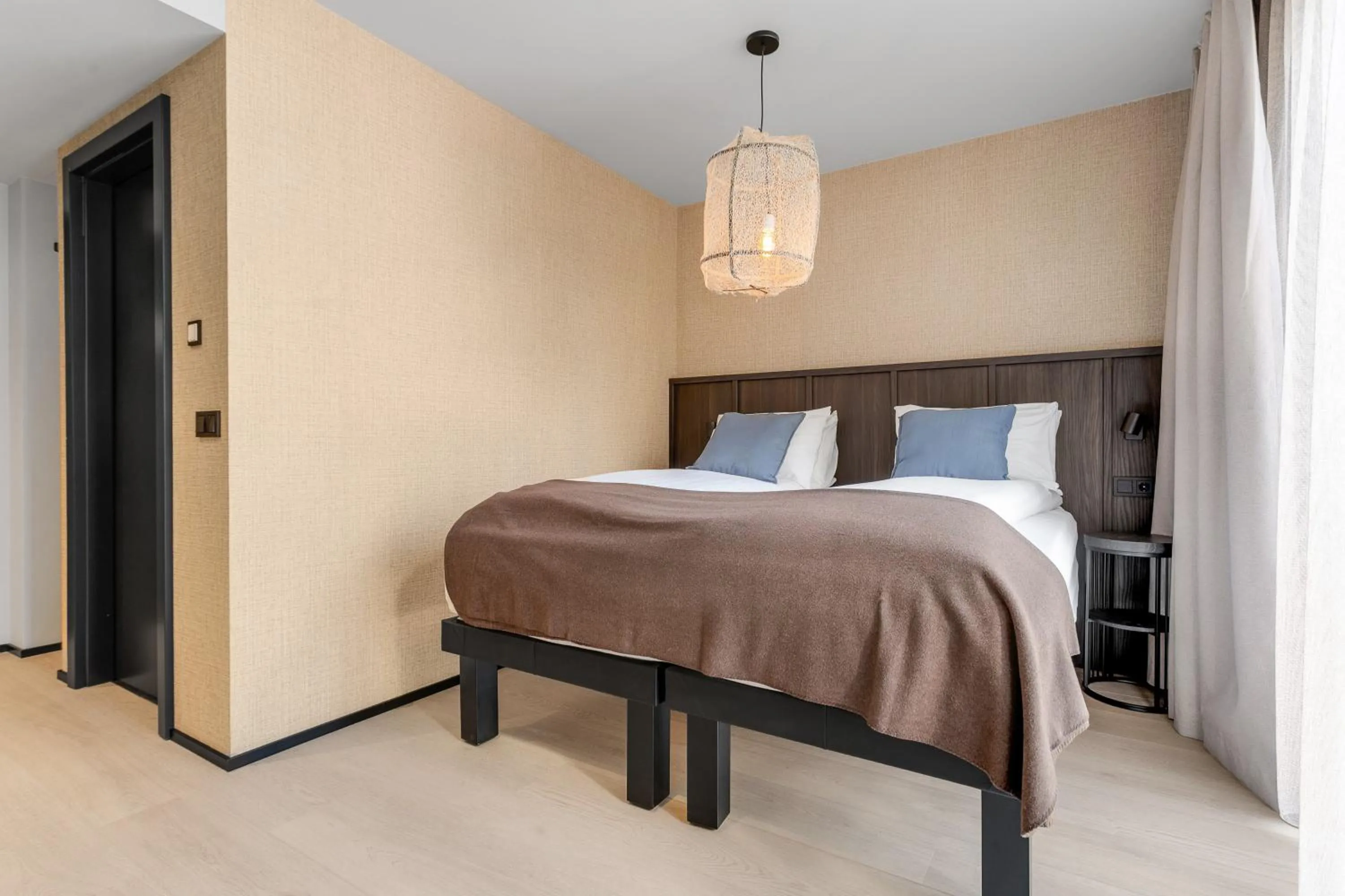 Bed in Strand Hotel Apartments