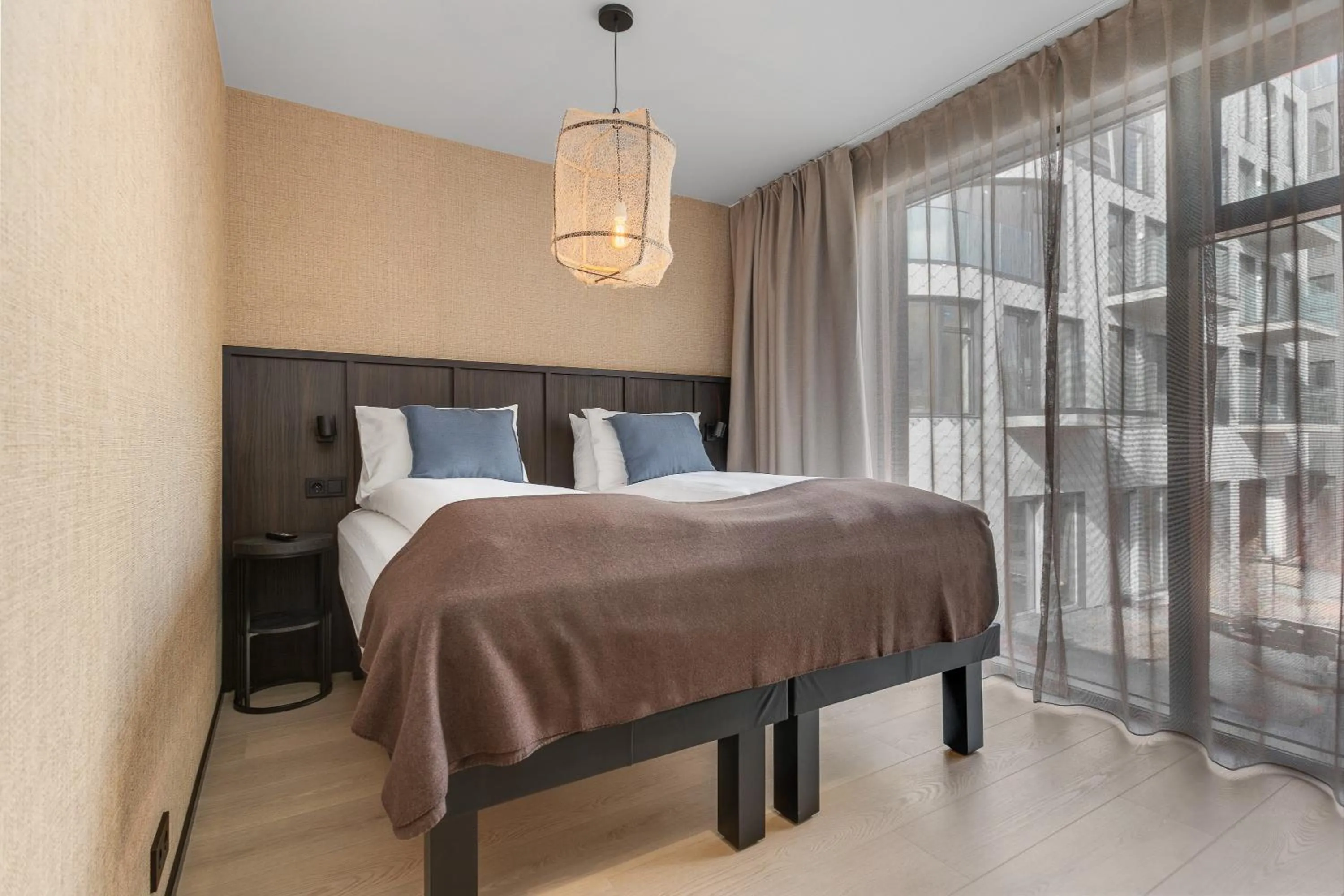 Bed in Strand Hotel Apartments