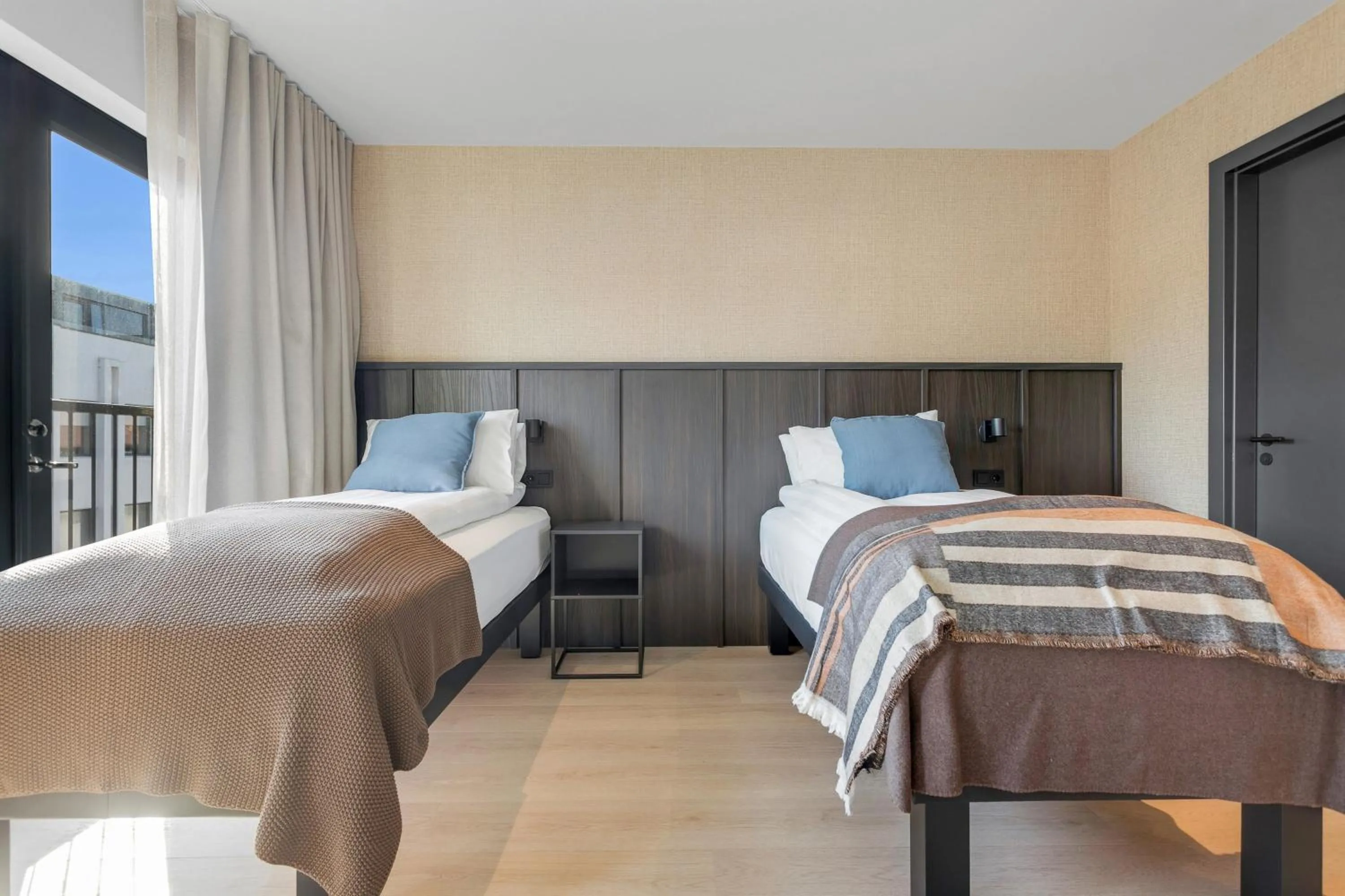Bed in Strand Hotel Apartments