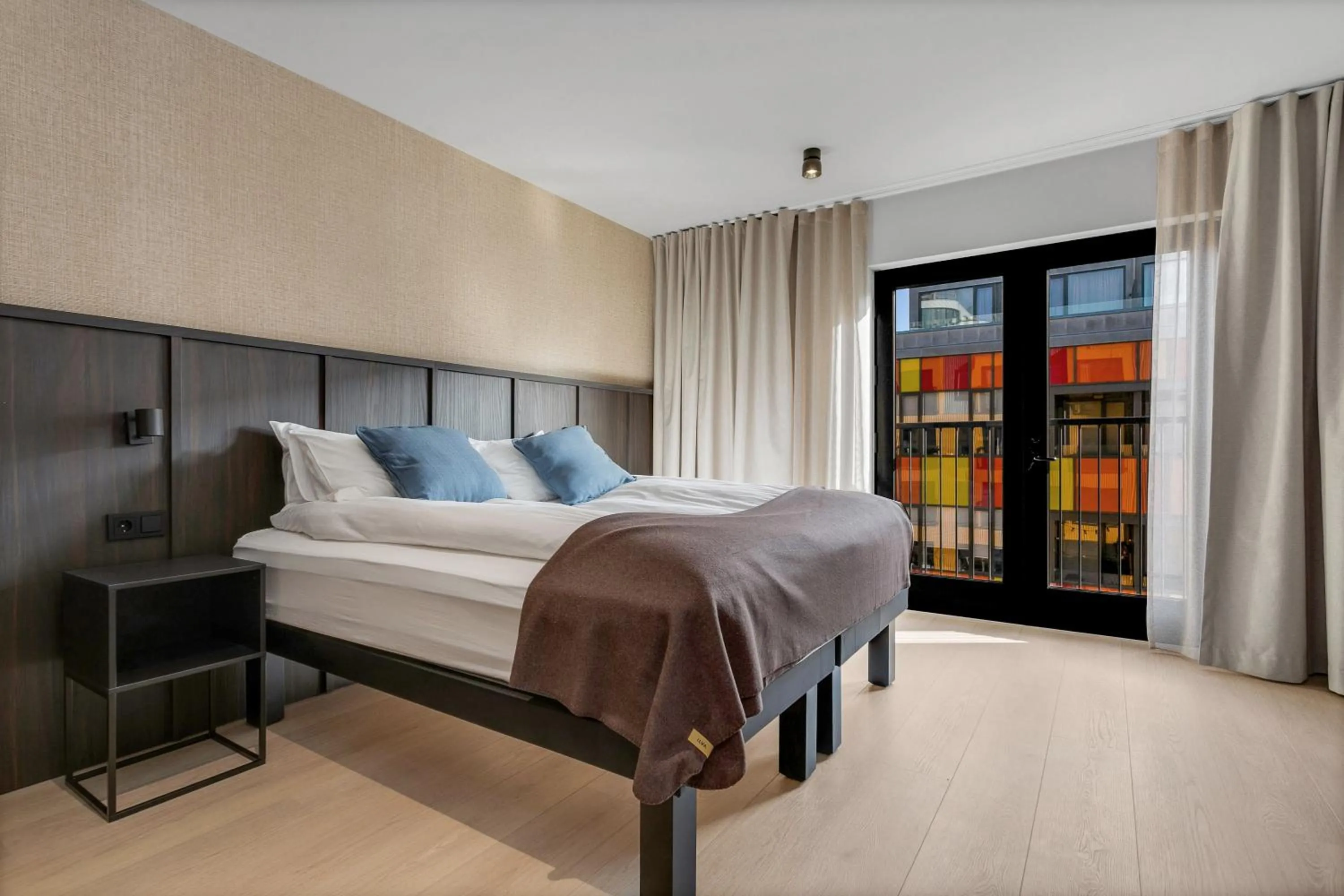 Bed in Strand Hotel Apartments