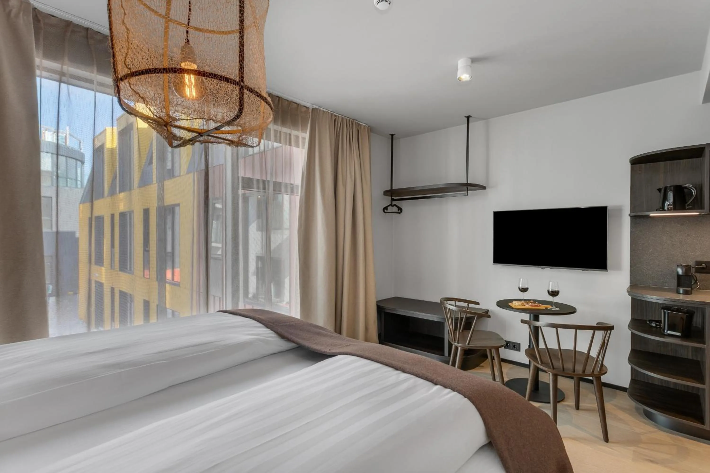 Bed in Strand Hotel Apartments