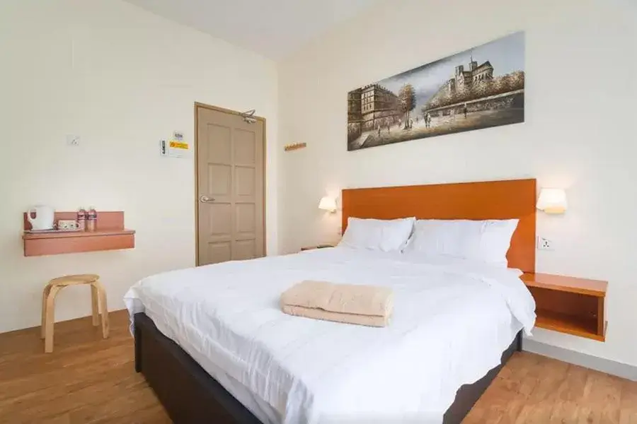 Bed in Penang Hill Lodge Bed in Penang Hill Lodge