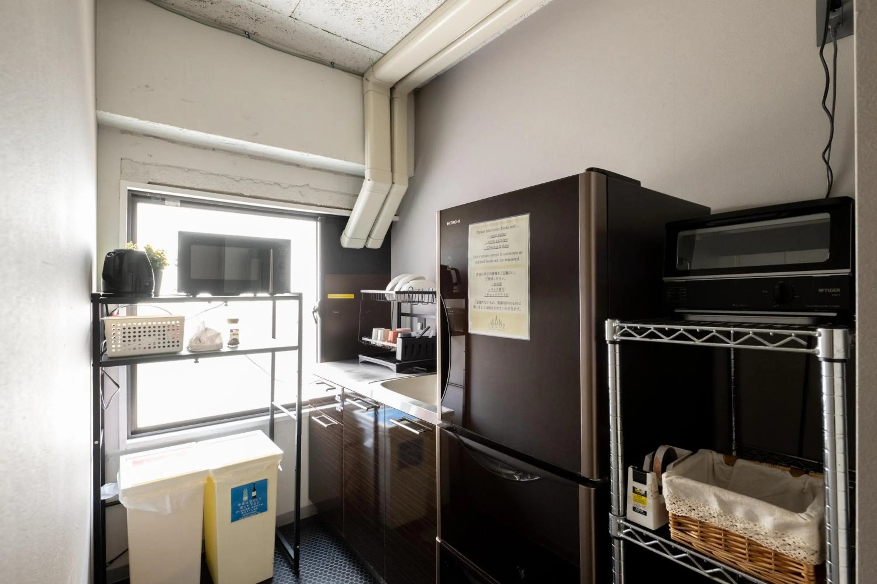 Communal kitchen in Imano Tokyo Hostel