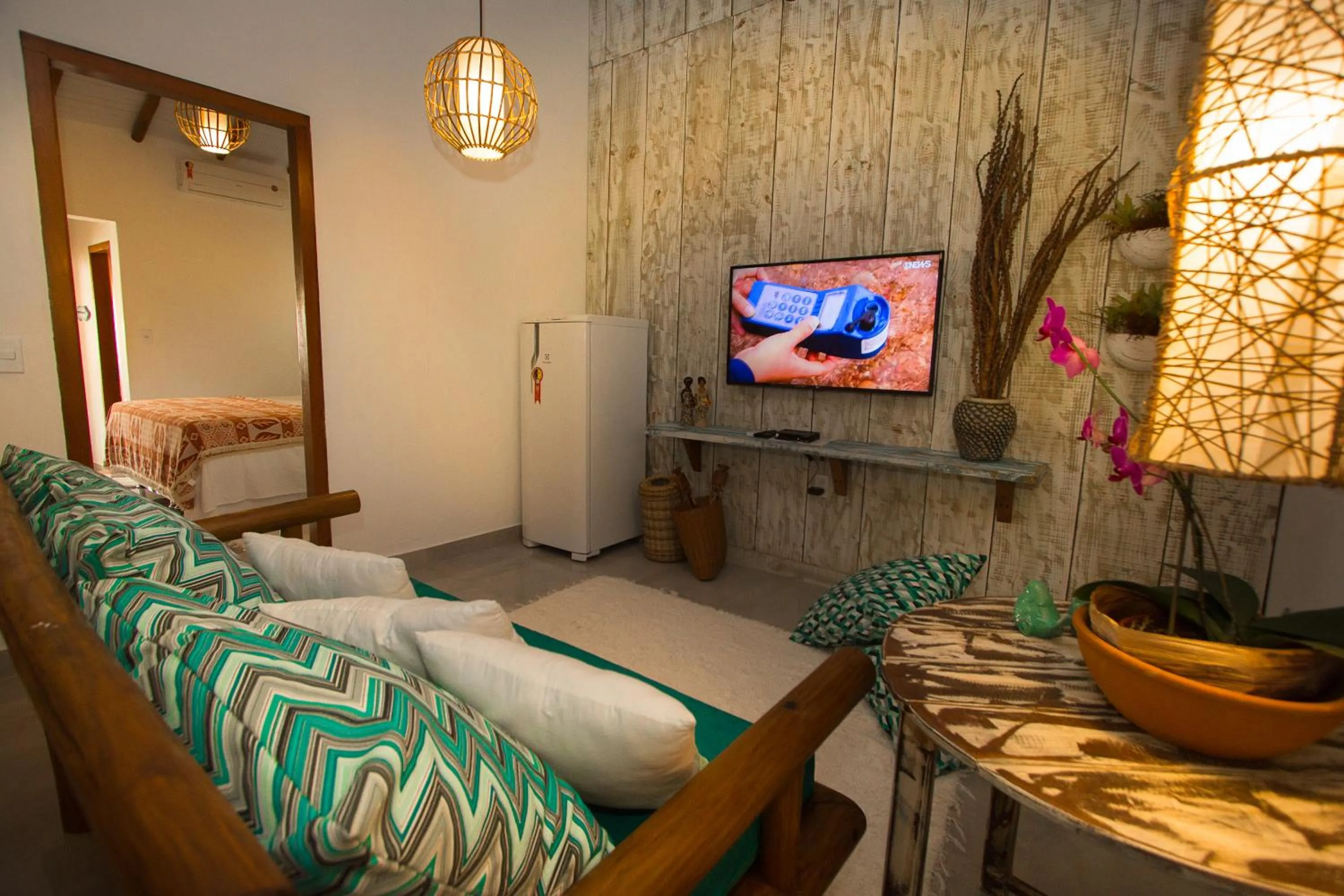 Communal lounge/ TV room, Bed in Rio Da Barra Villa Hotel