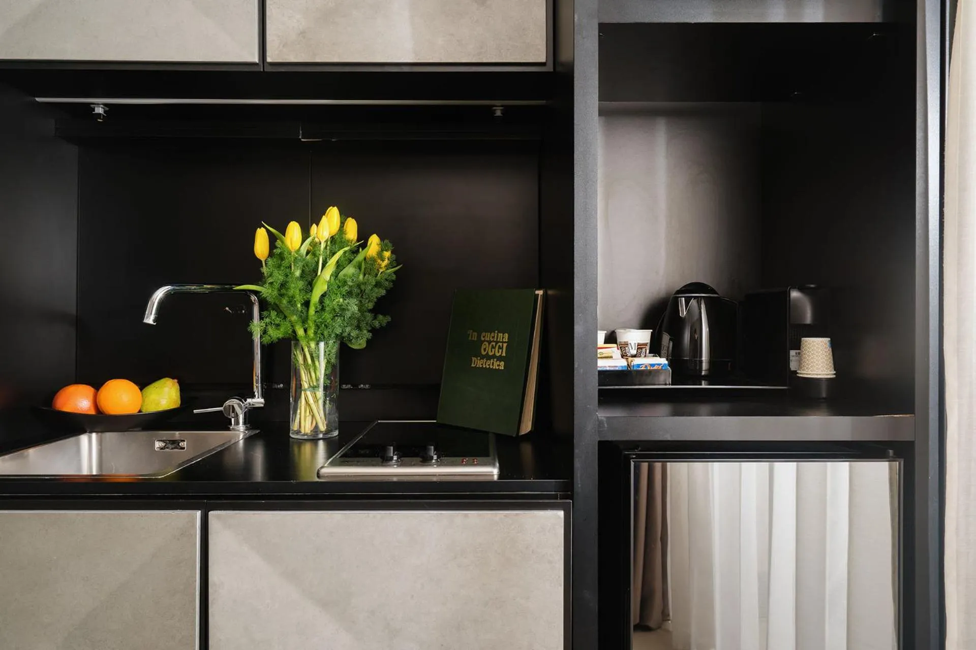 Kitchen or kitchenette in Unica Suites Rome