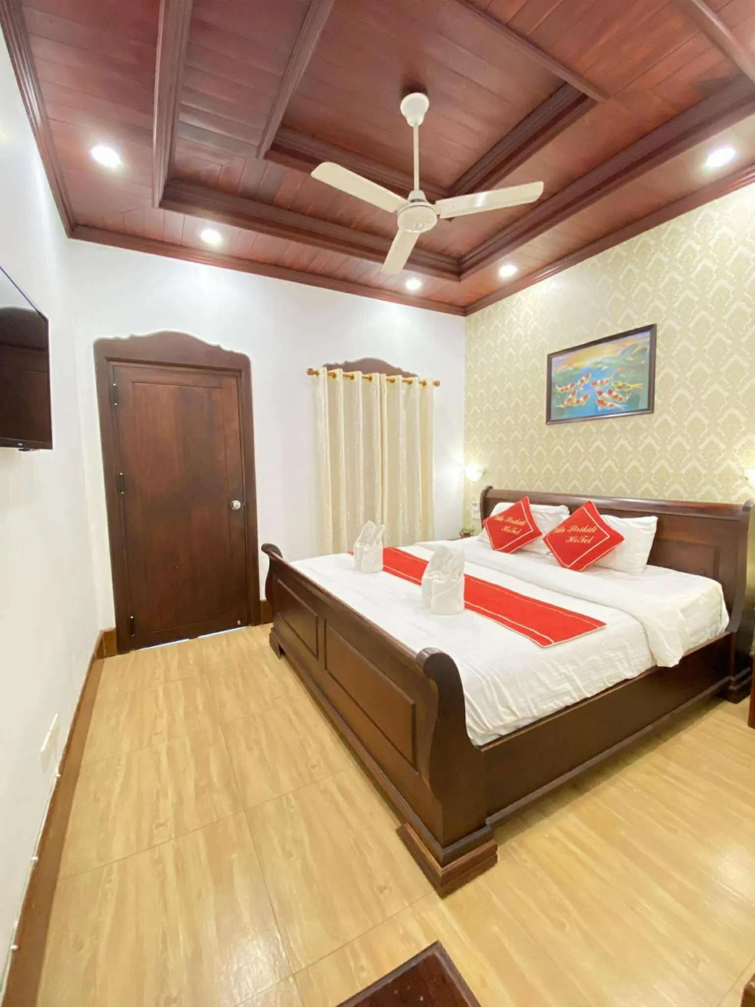 Bed in Villa Sirikili Hotel Luang Prabang