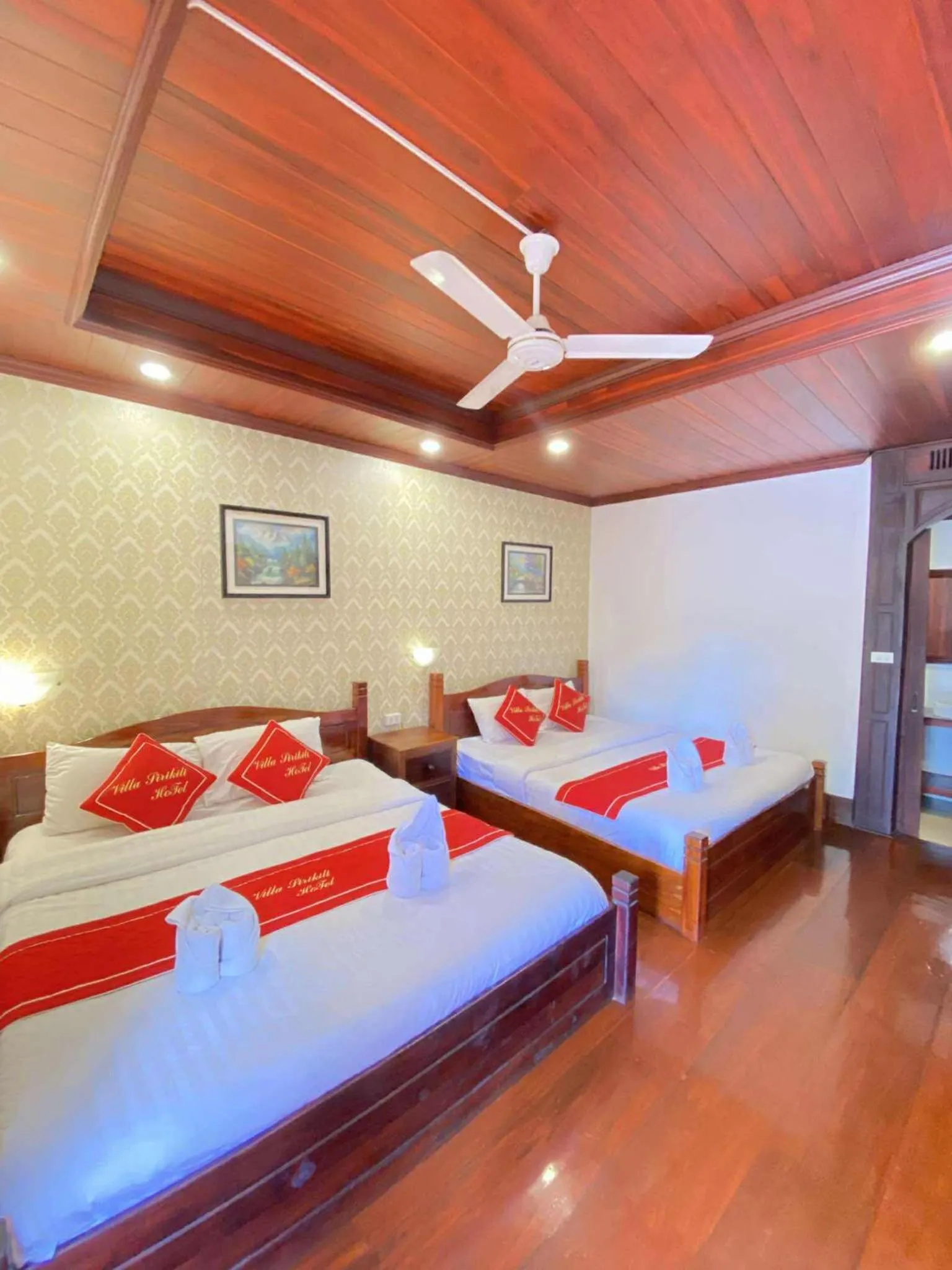 Bed in Villa Sirikili Hotel Luang Prabang