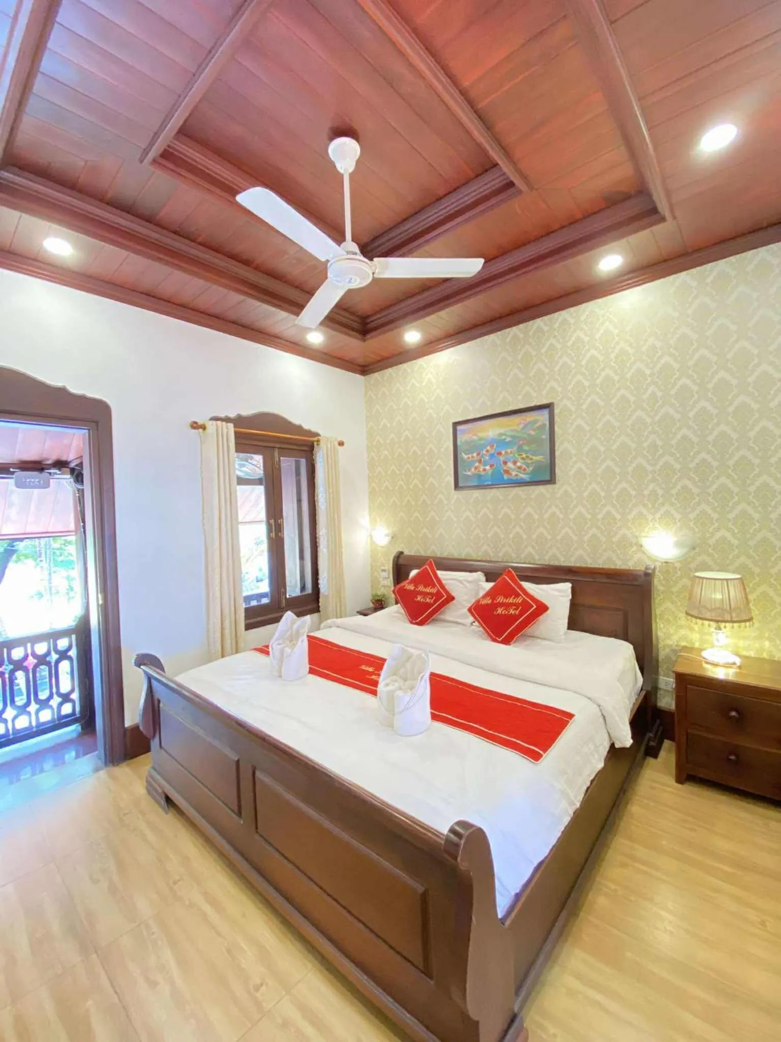 Bed in Villa Sirikili Hotel Luang Prabang