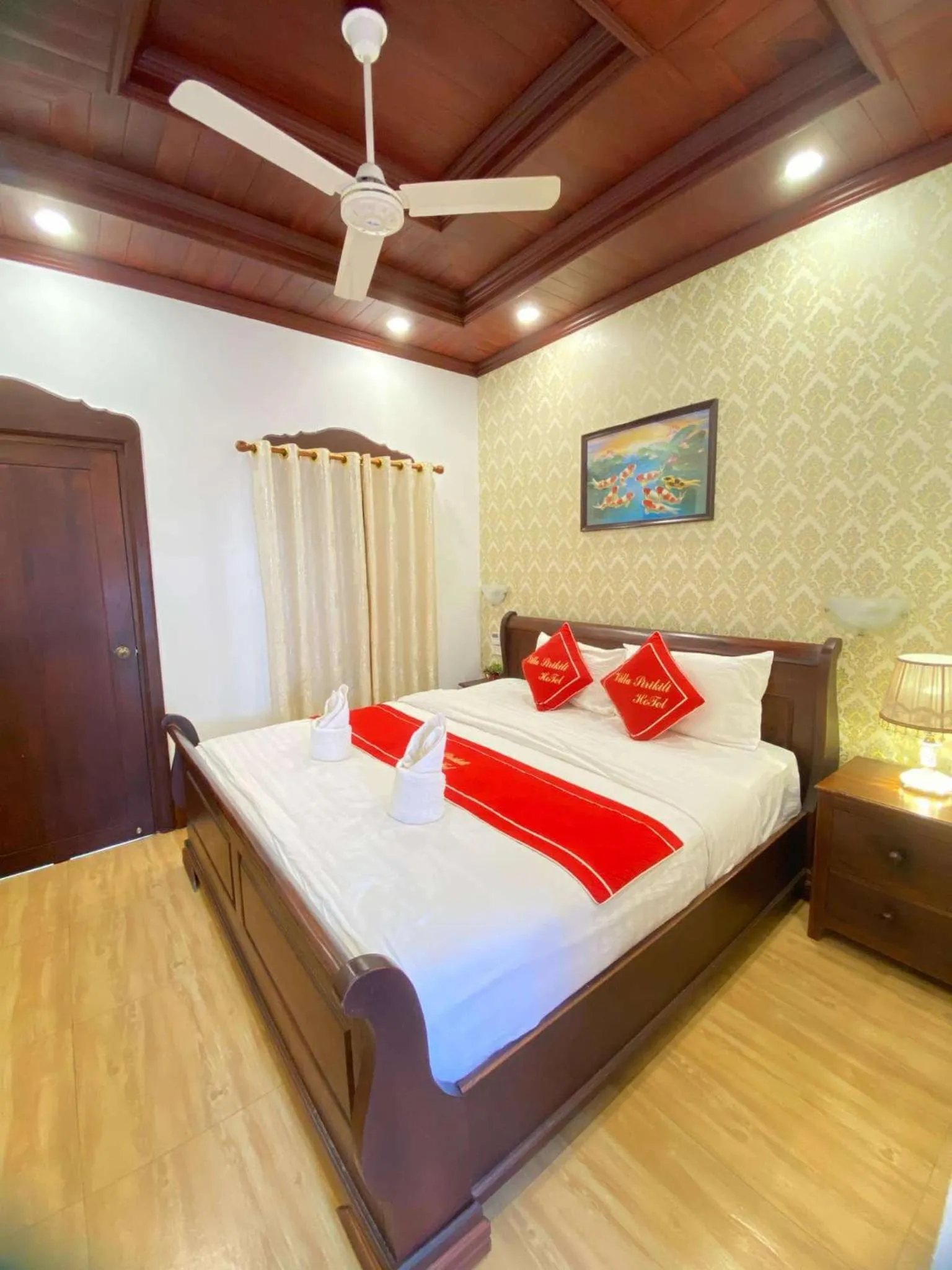 Bed in Villa Sirikili Hotel Luang Prabang