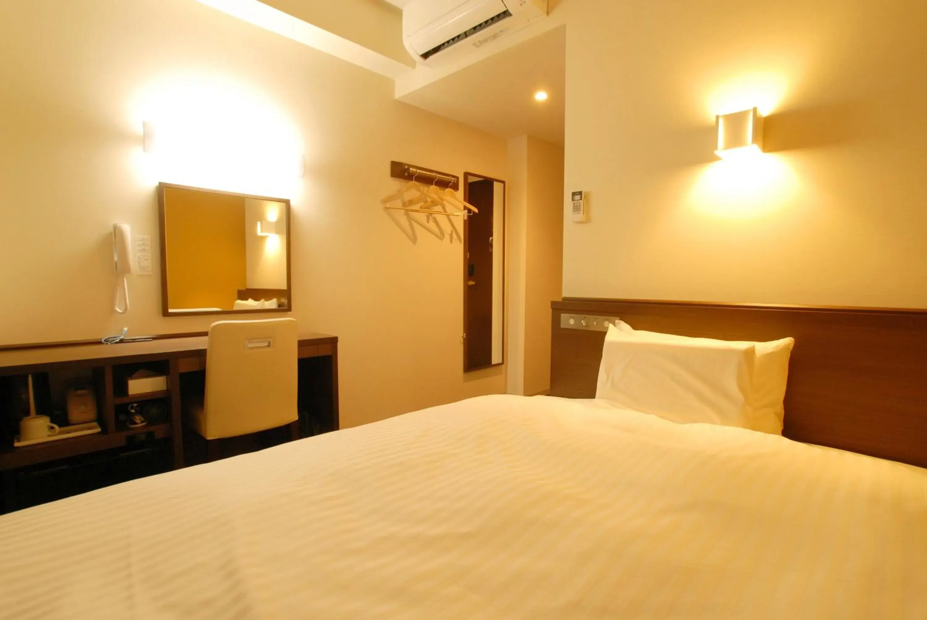 Bed in AB Hotel Fukaya Bed in AB Hotel Fukaya