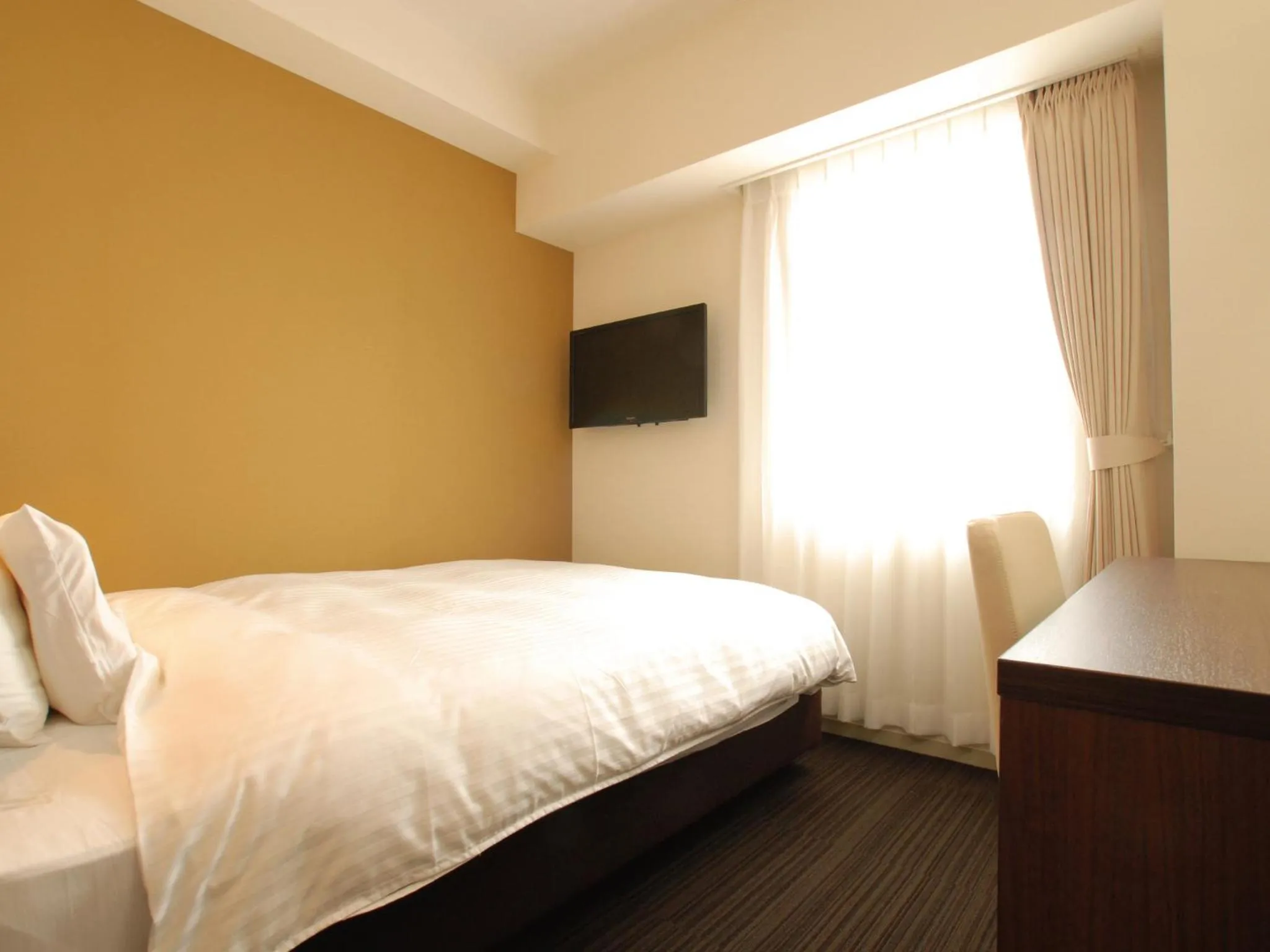 Bed in AB Hotel Fukaya