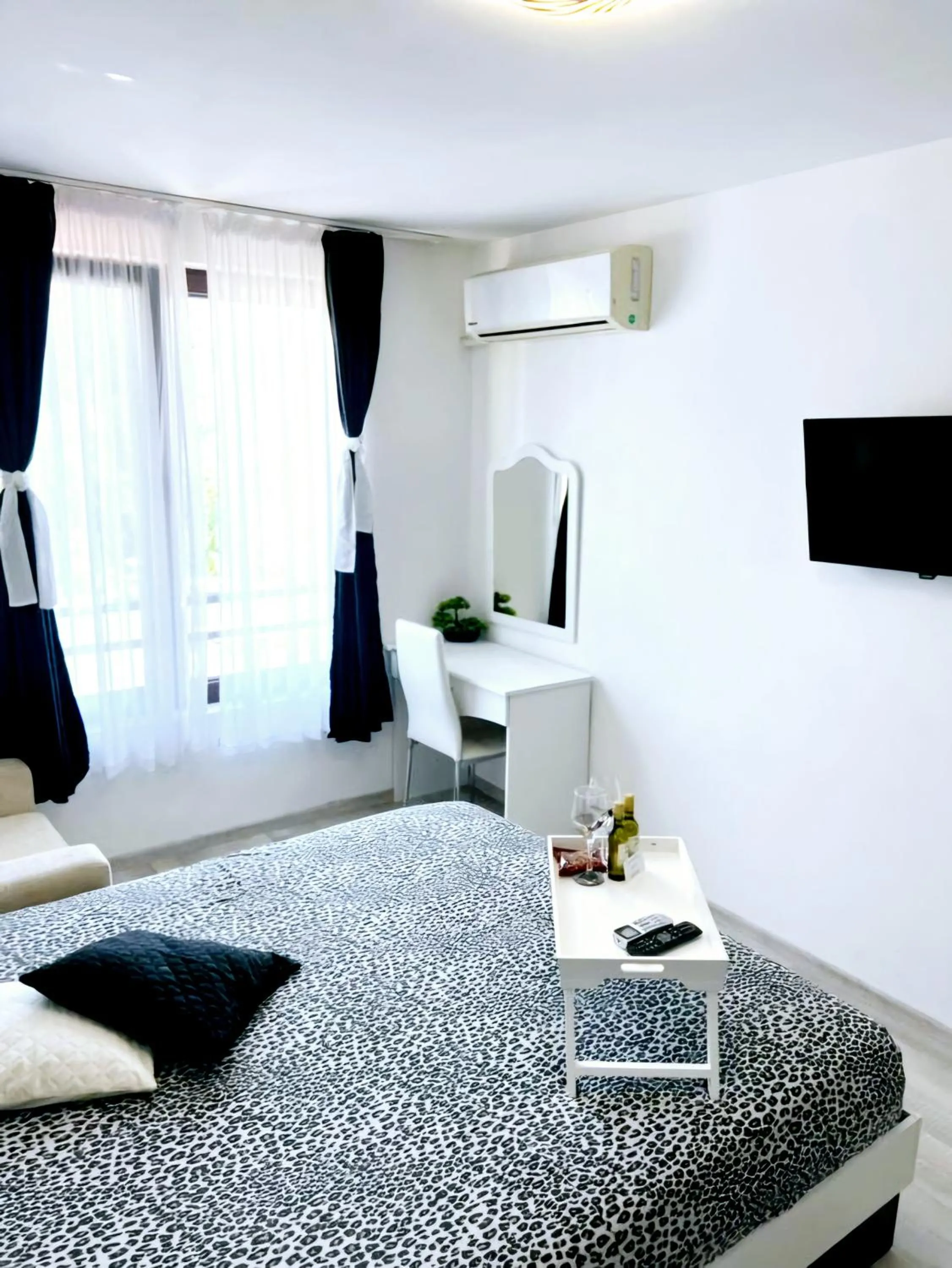 Bed in Deva Apartments