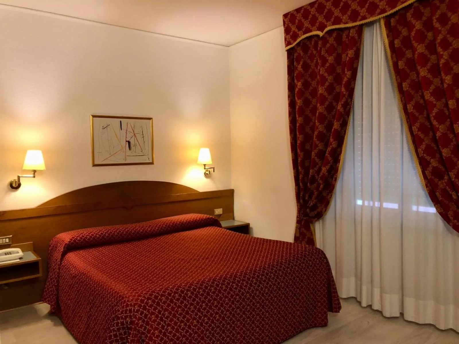 Bed in Hotel Arcadia