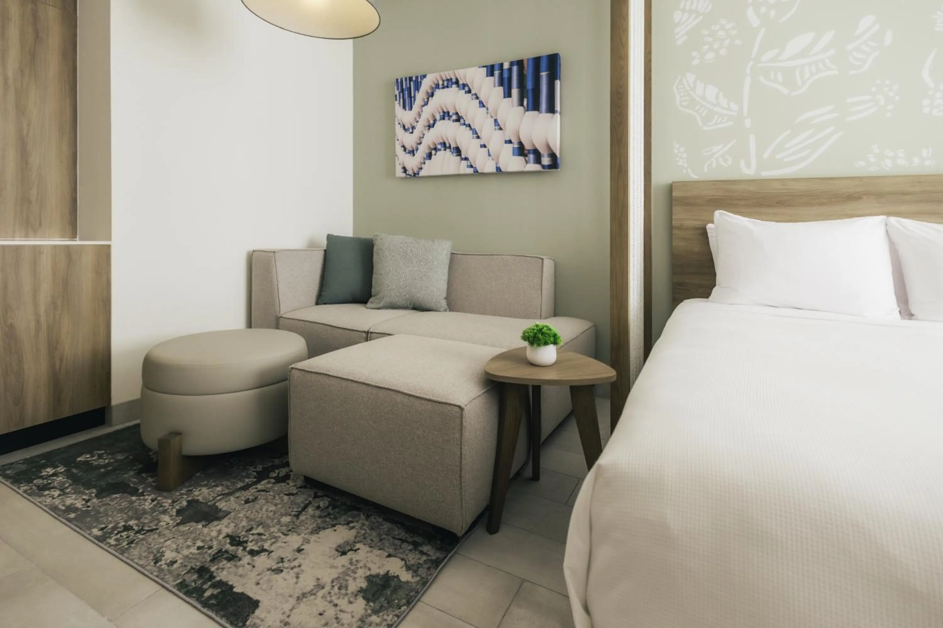 Seating area, Bed in Hyatt Place Cancun Airport