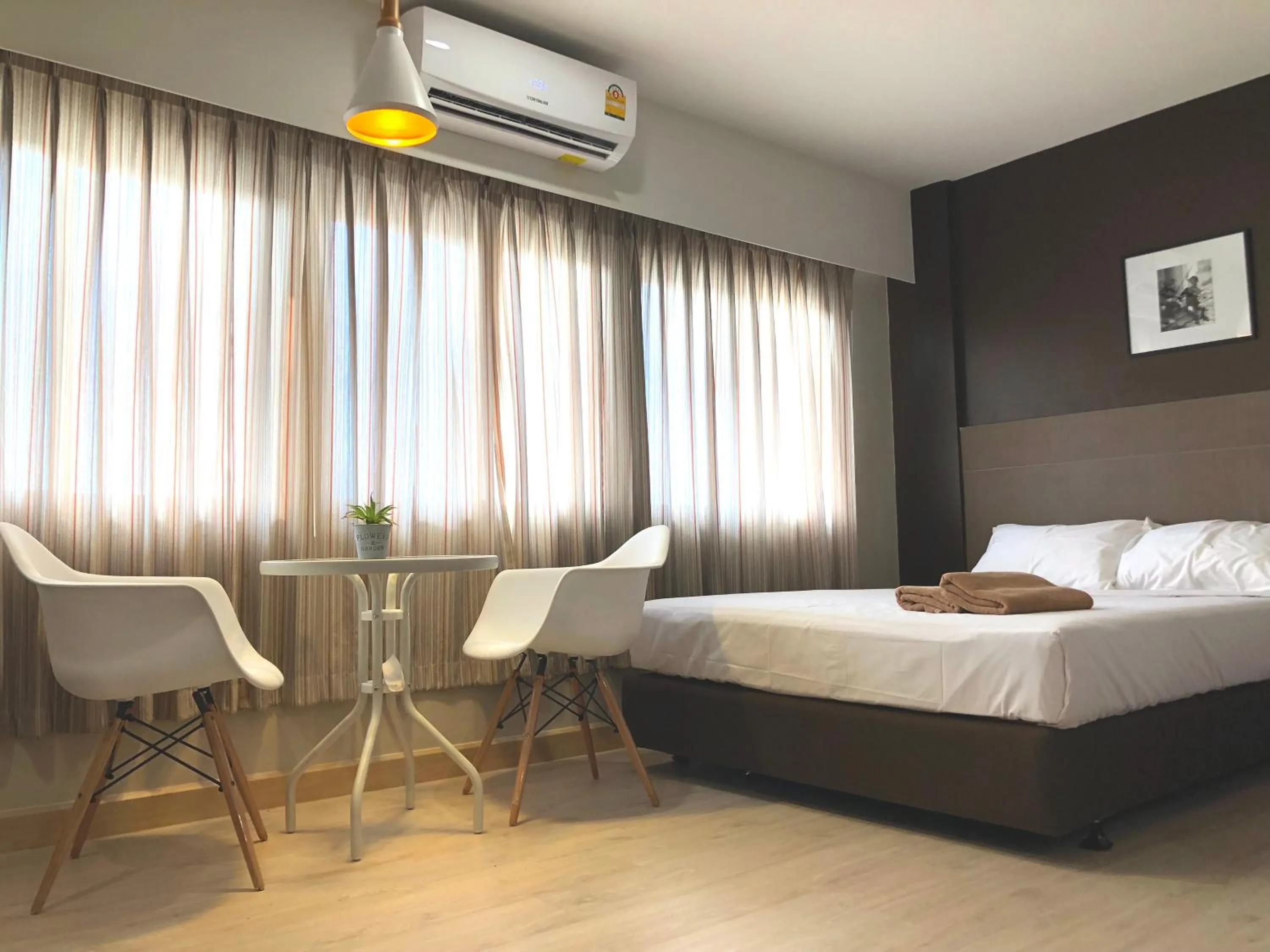 Bed in Srivichai Hotel