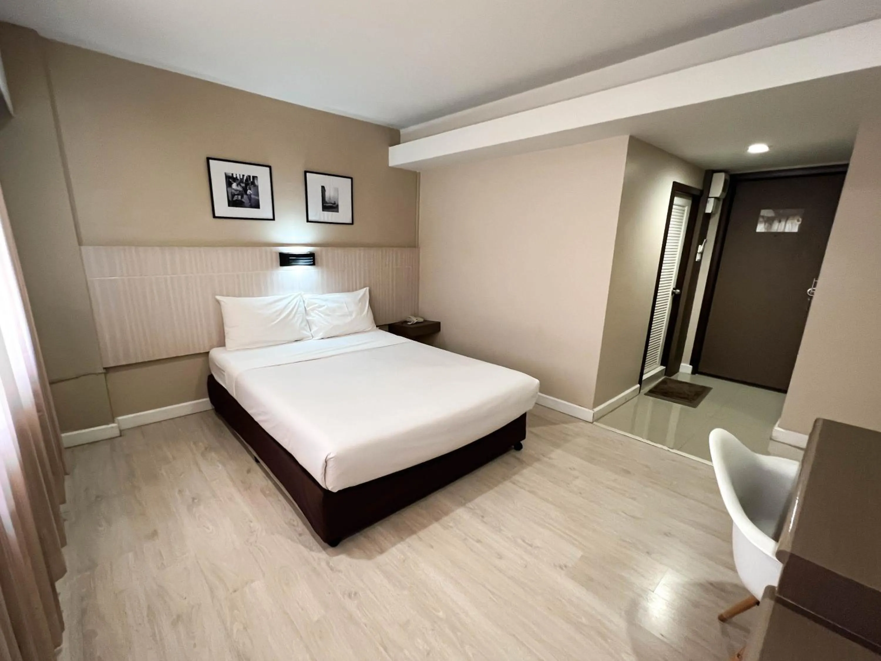 Bed in Srivichai Hotel