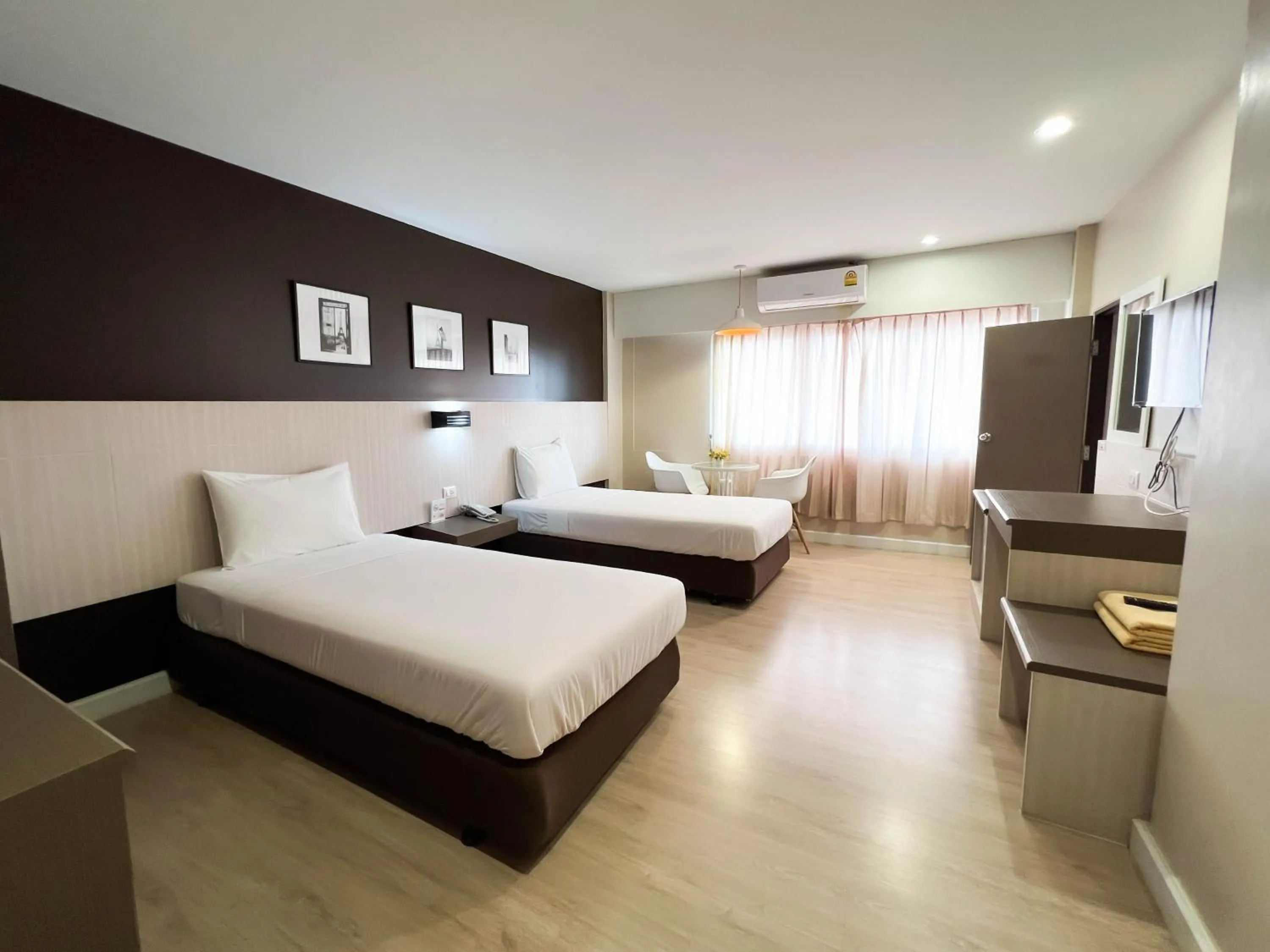 Bed in Srivichai Hotel