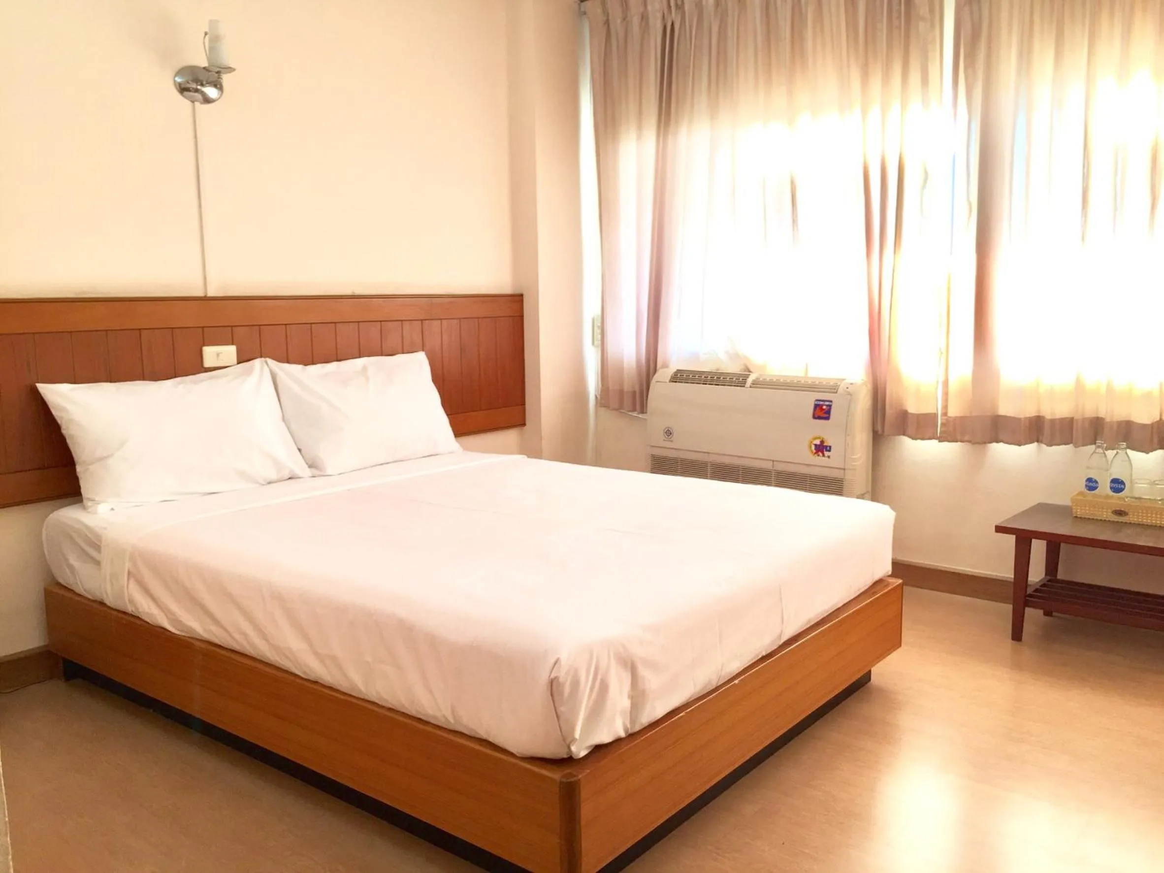 Bed in Srivichai Hotel