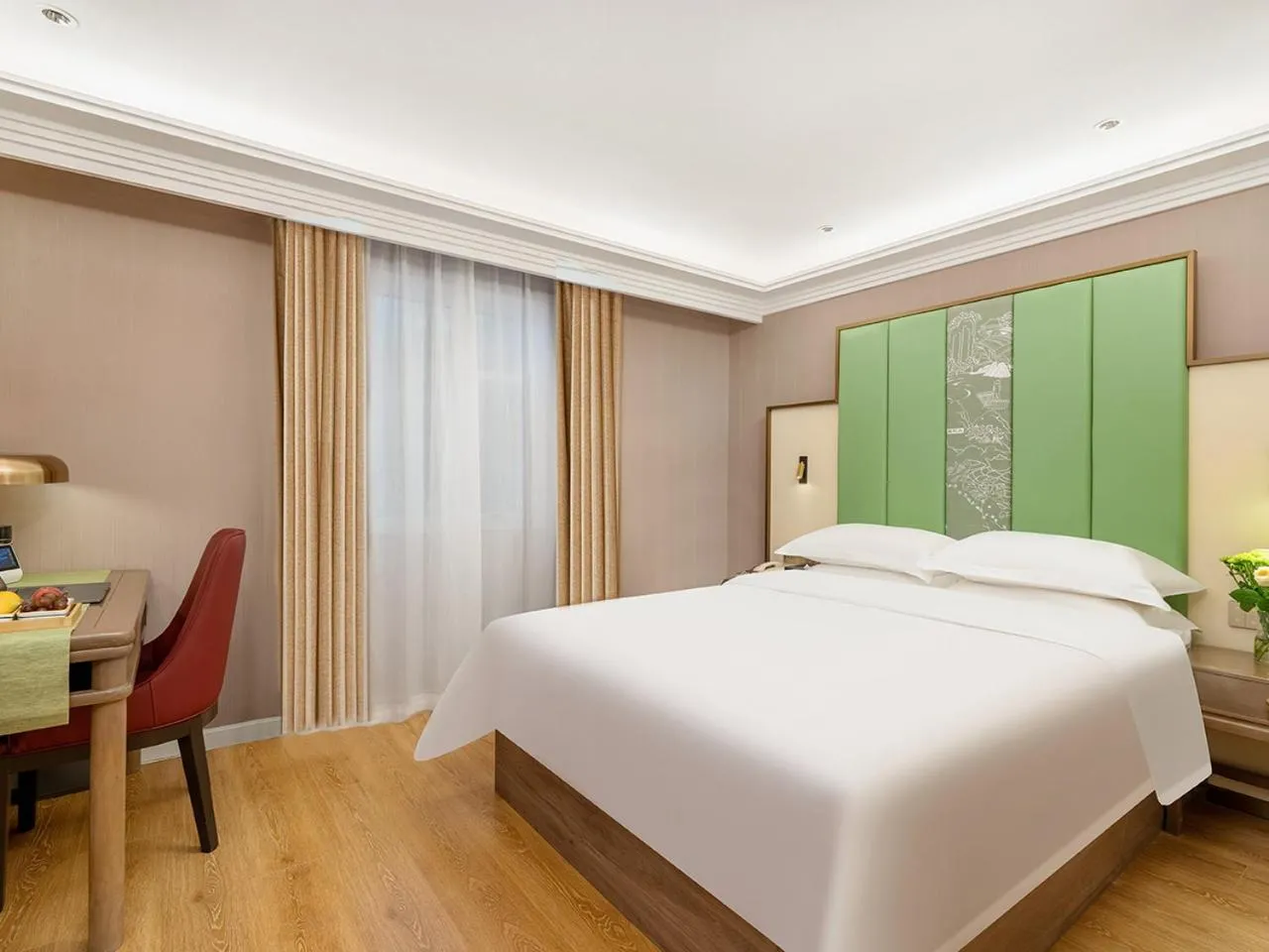 Bed in Jinjiang Metropolo Wuyishan Sangu Resort Hotel
