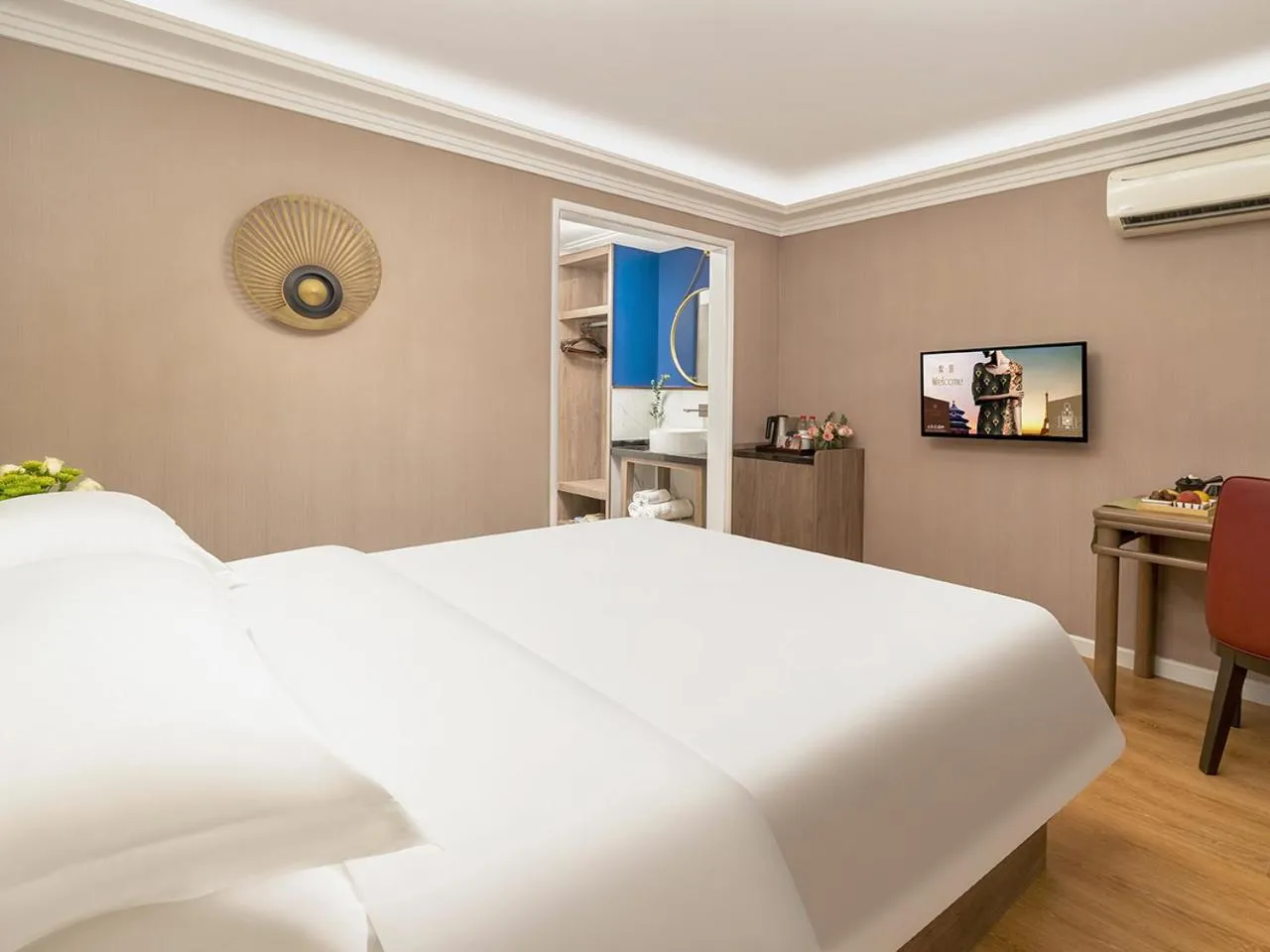 Bed in Jinjiang Metropolo Wuyishan Sangu Resort Hotel