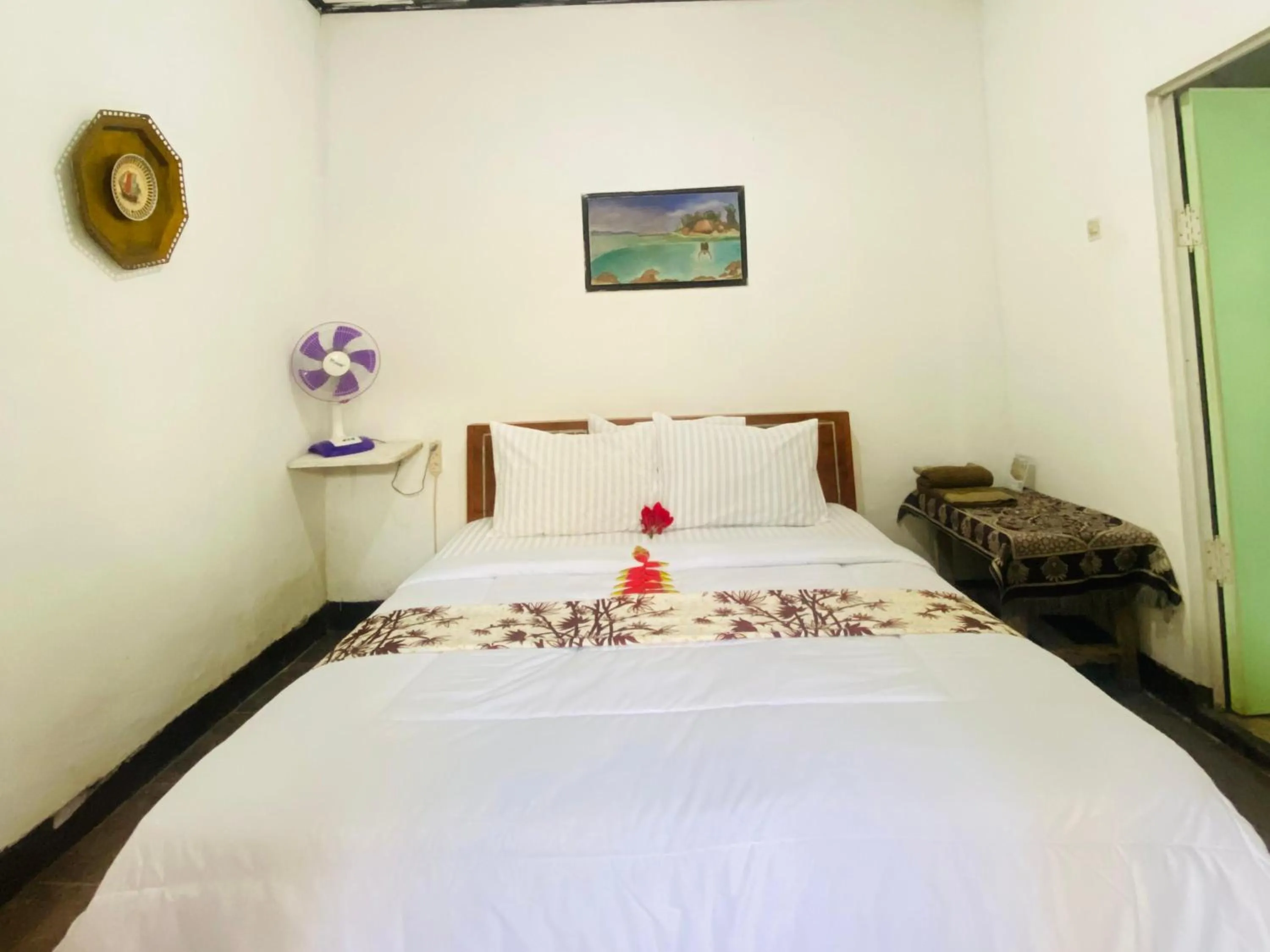 Bed in Kembang Kuning Cottages
