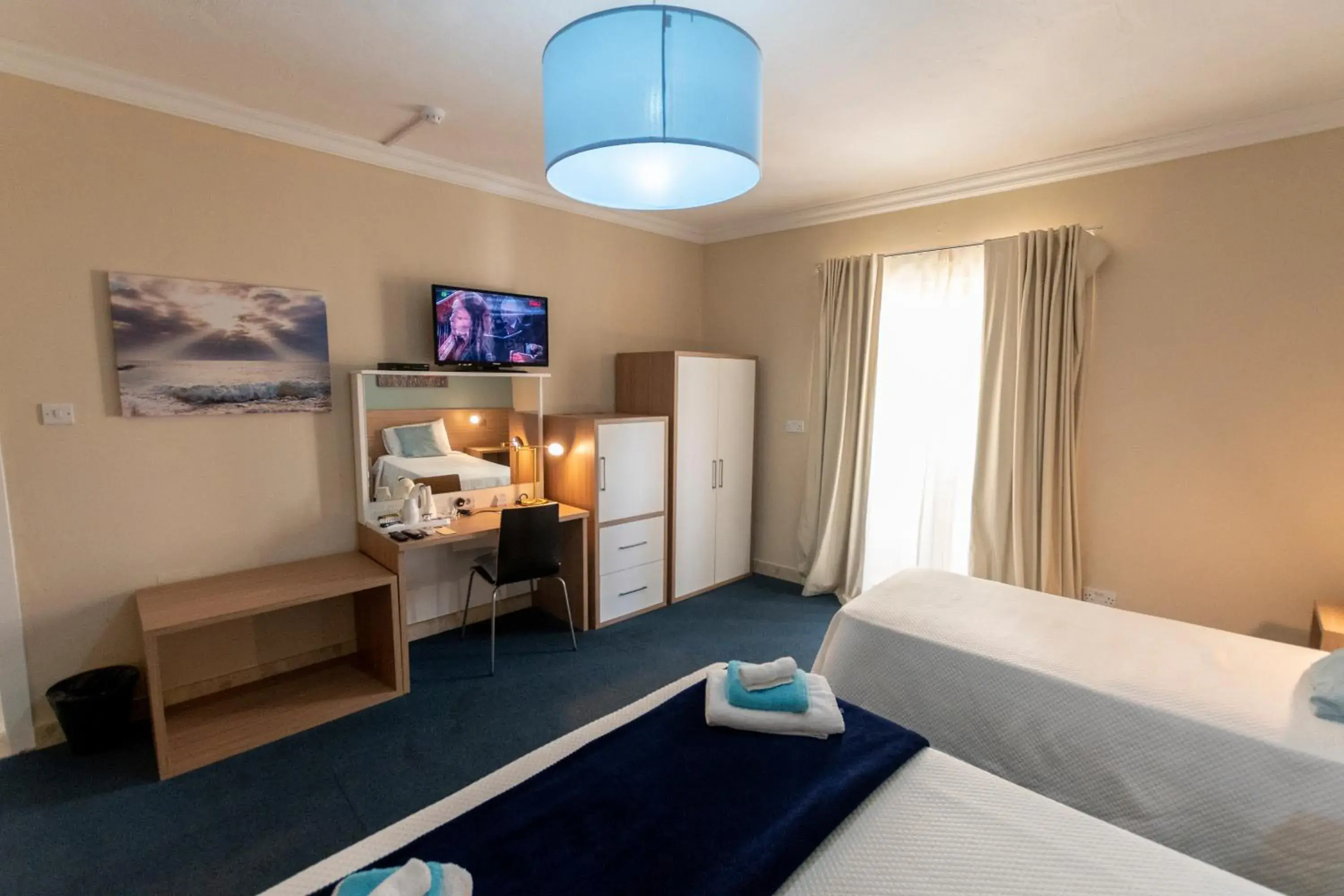 Standard Triple Room with Balcony in Estrella Lodging Standard Triple Room with Balcony in Estrella Lodging