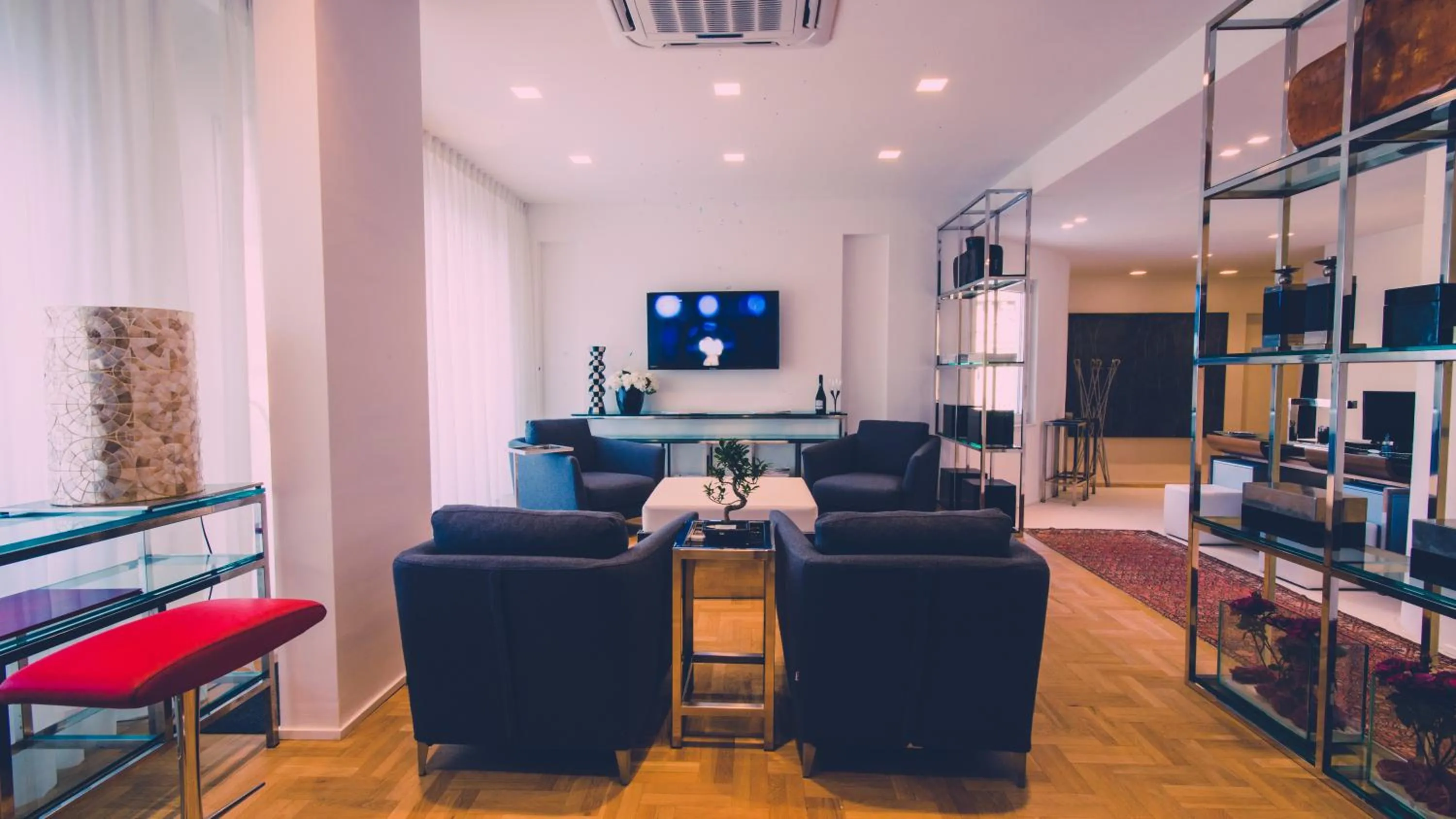 Communal lounge/ TV room in Siracusa Luxury Apartment
