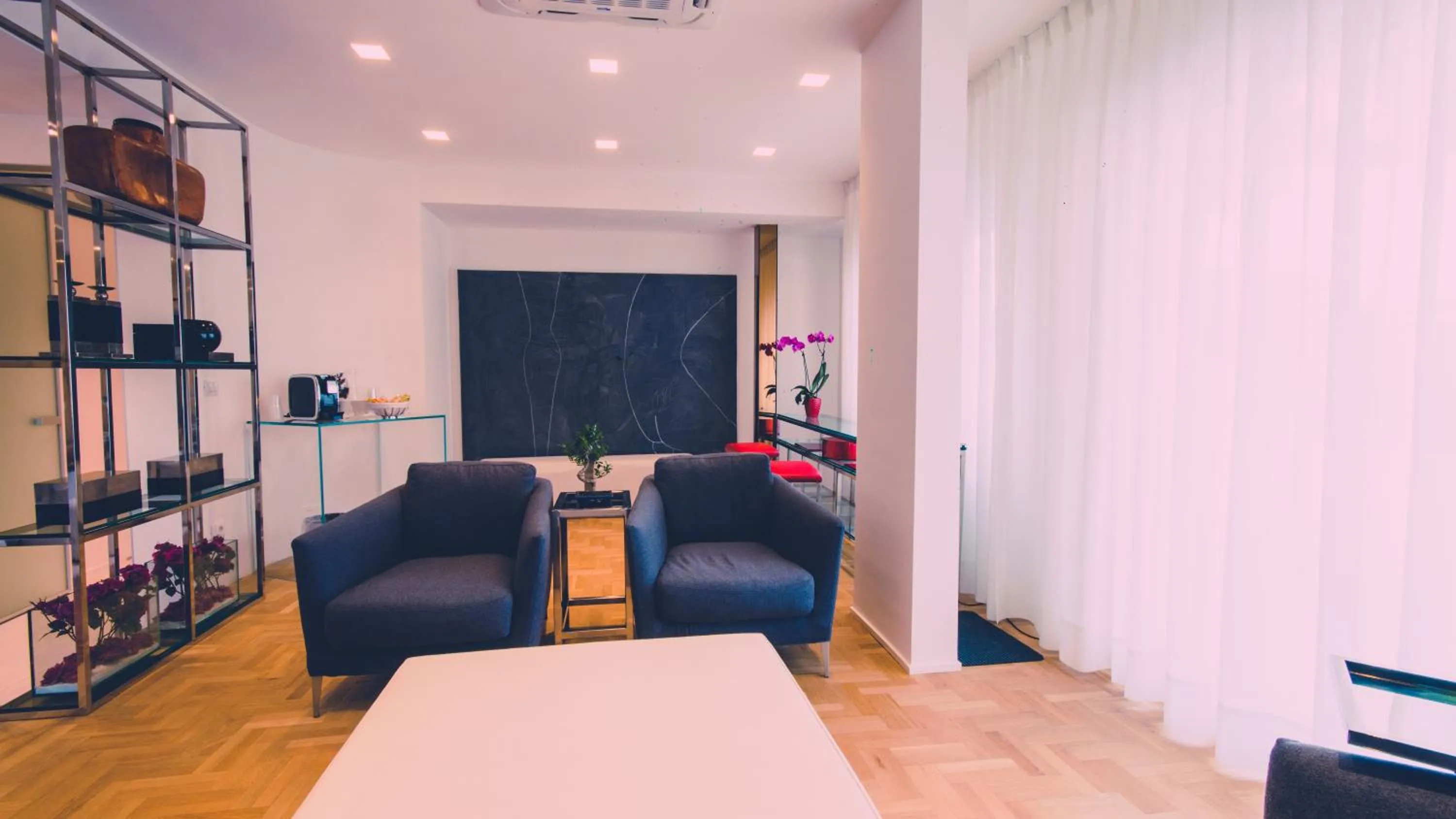 Communal lounge/ TV room in Siracusa Luxury Apartment