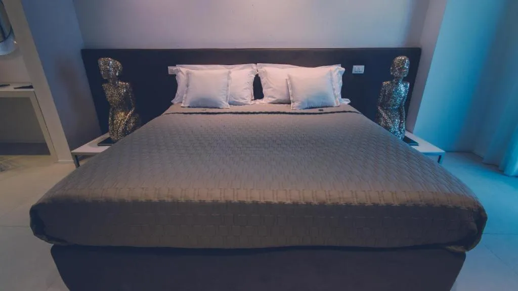 Bed in Siracusa Luxury Apartment