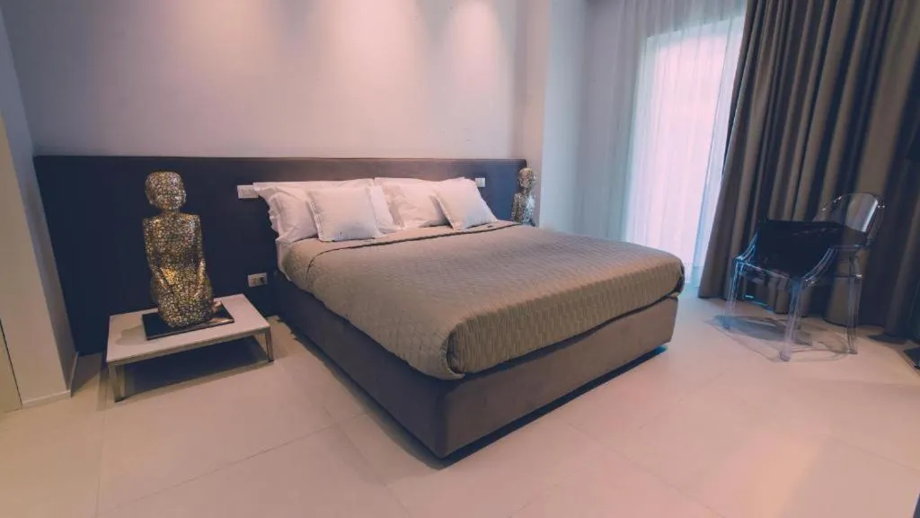 Bed in Siracusa Luxury Apartment
