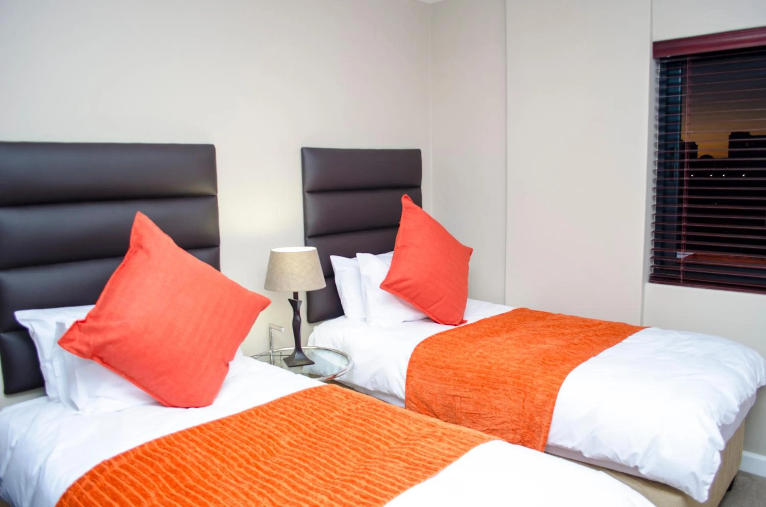 Bed in Knightsbridge Luxury Apartments