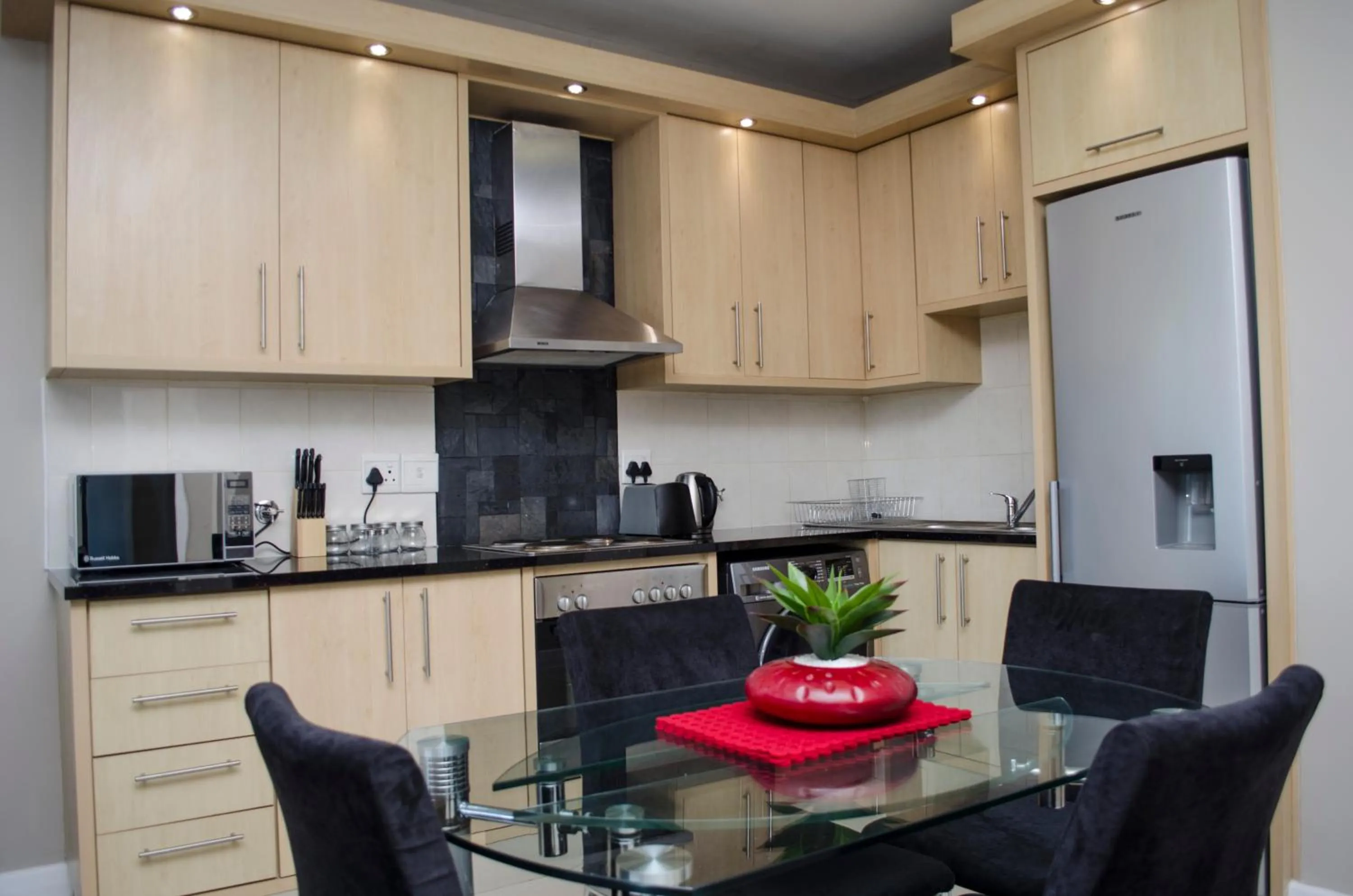 Kitchen or kitchenette in Knightsbridge Luxury Apartments