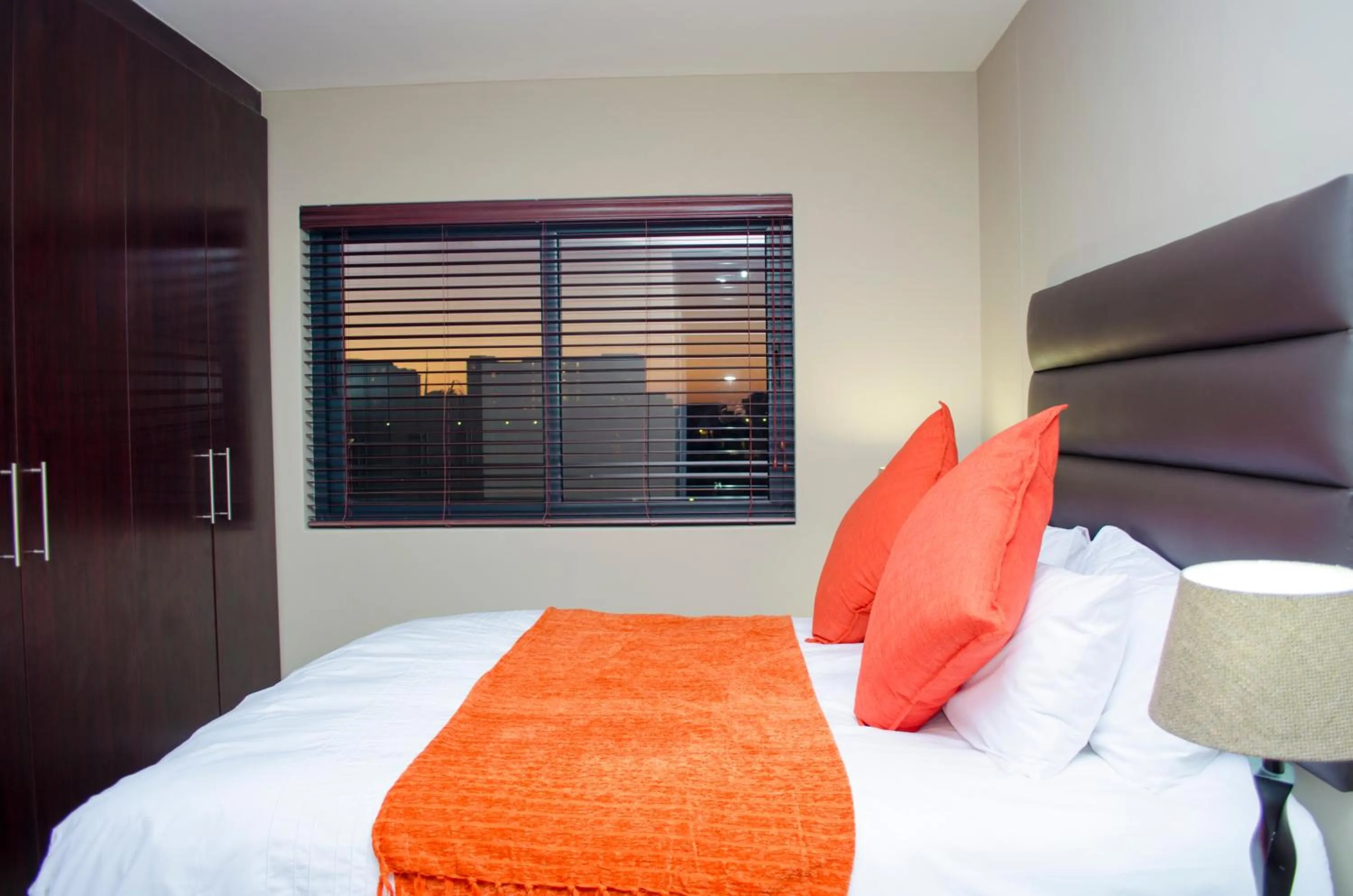 Bed in Knightsbridge Luxury Apartments