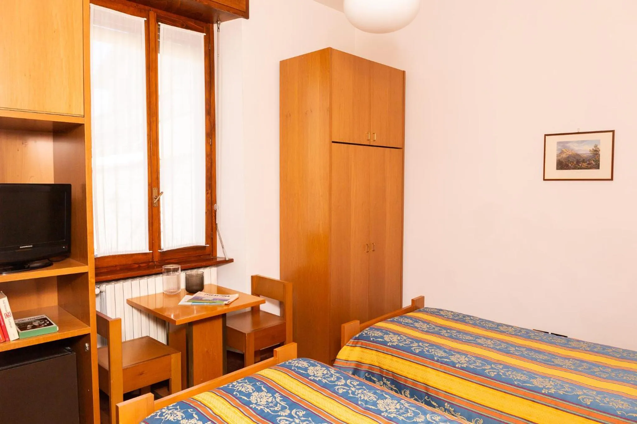 Photo of the whole room, Bed in Albergo Sacro Monte Varese