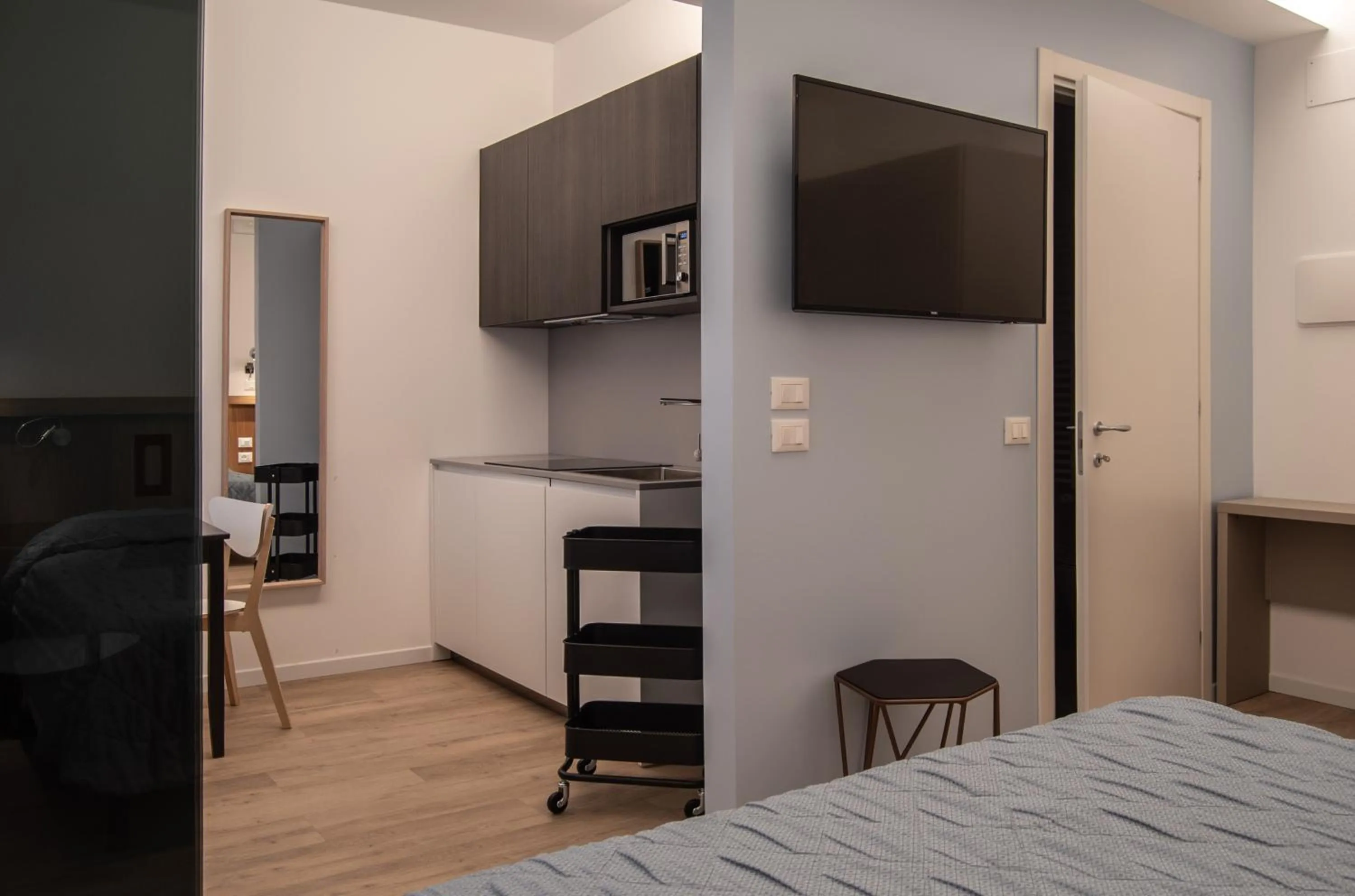 Kitchen or kitchenette, Bed in Hotel Oliva