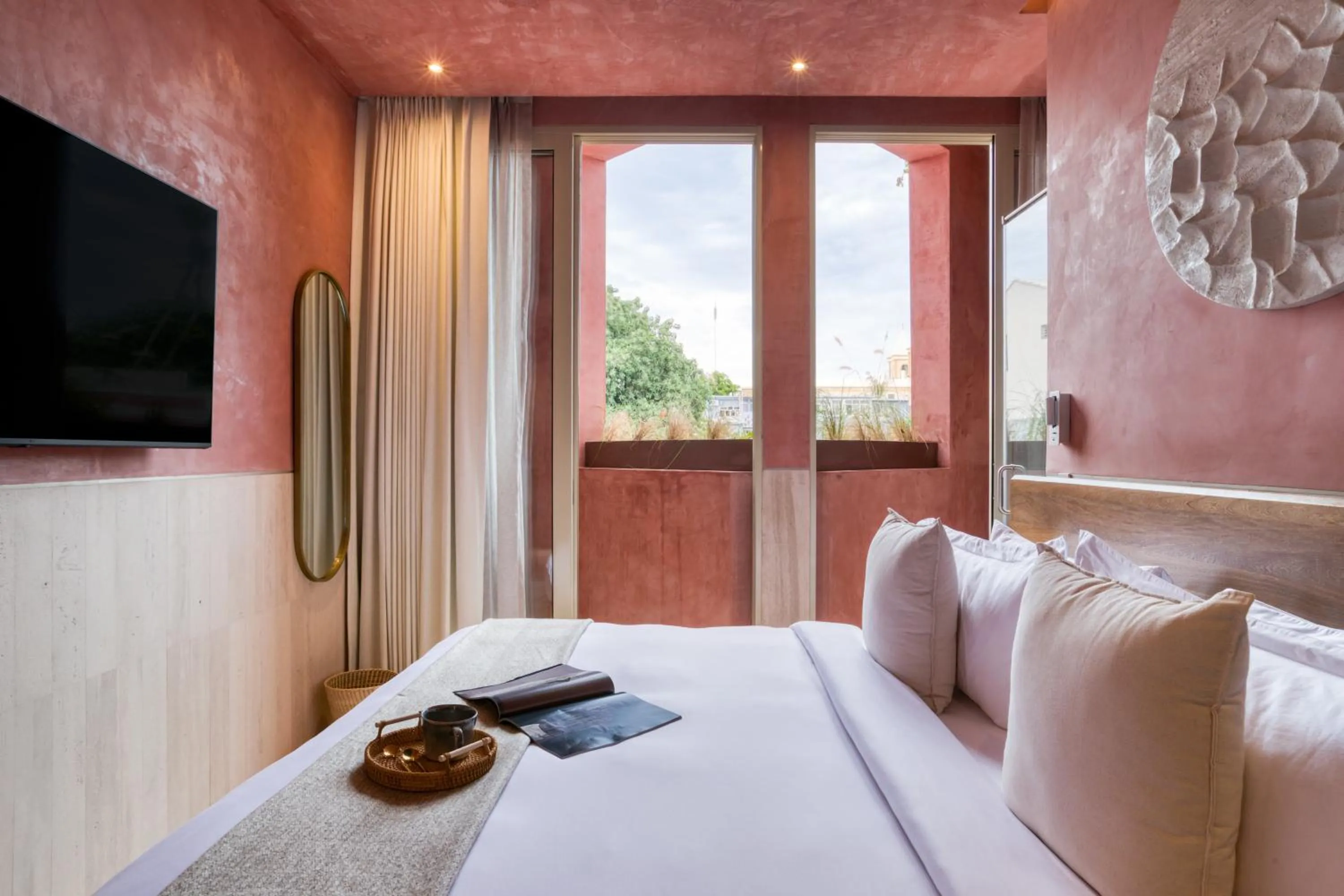 Bed in Laiva Hotel San Jose by Tasman