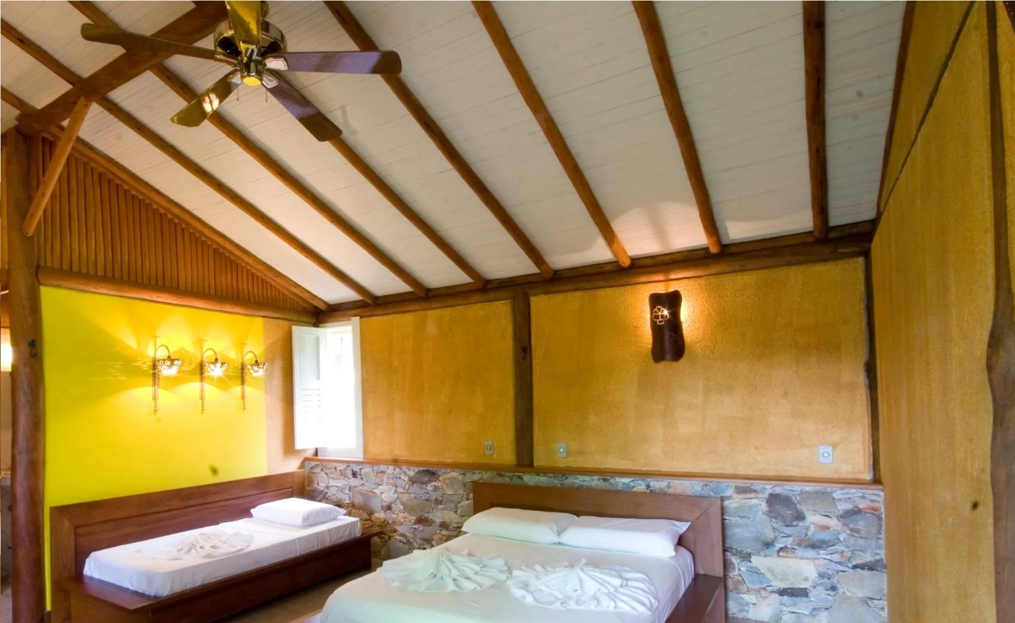 Bed in Rancho Cipo Pousada