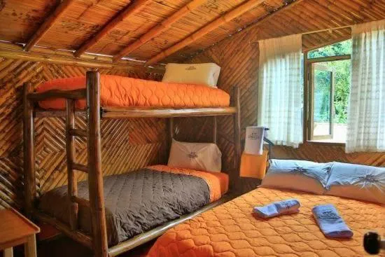 Bed in La Posada de Mindo