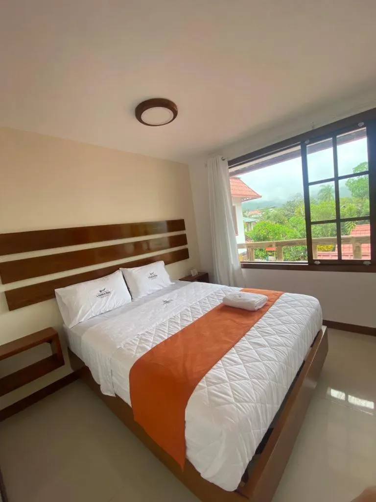 Bed in La Posada de Mindo